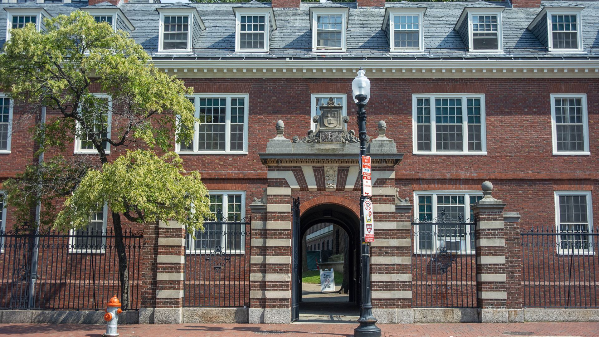 Entrance gate in front of a building at Harvard University 