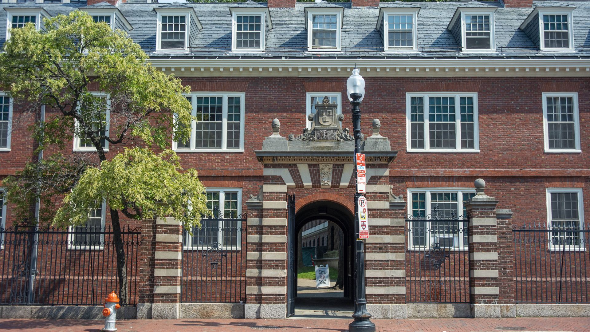 Entrance gate in front of a building at Harvard University