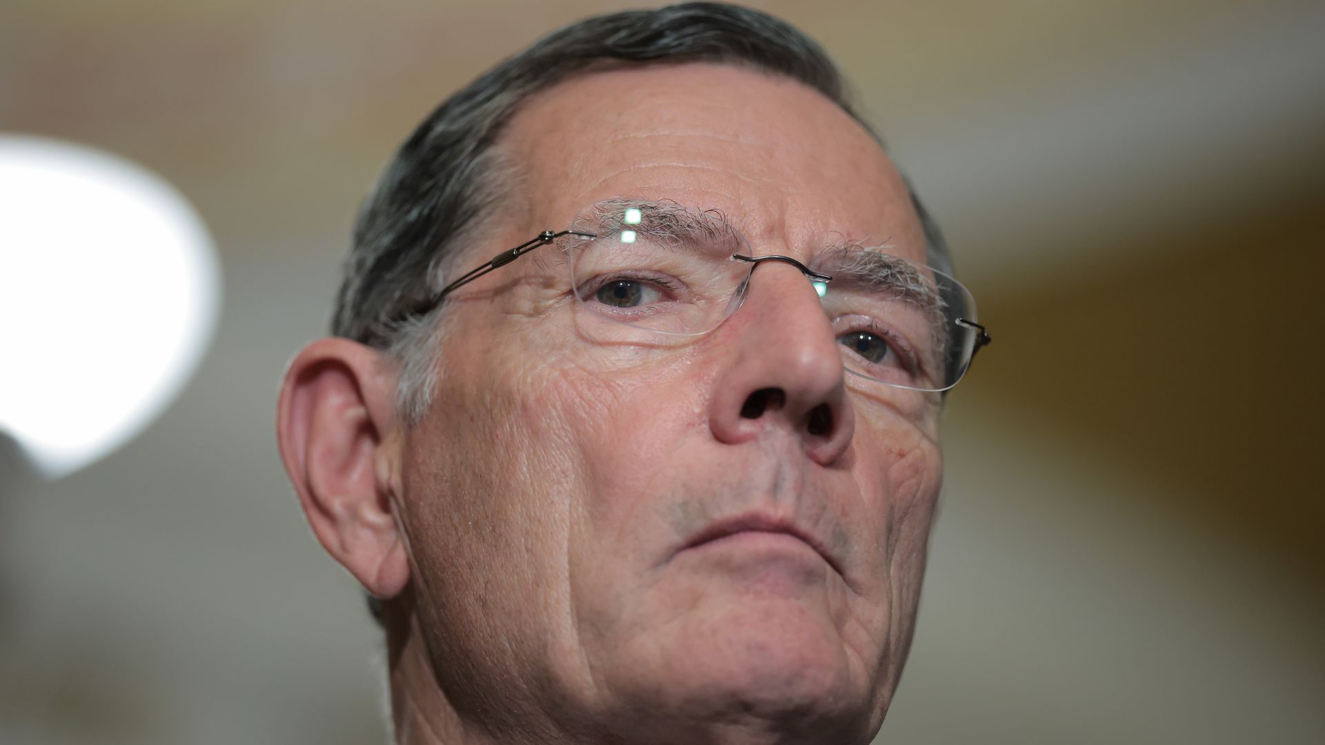 U.S. Senate Majority Whip John Barrasso (R-WY) stands alongside Senate Majority Leader John Thune (R-SD) following the weekly Republican Senate policy luncheon at the U.S. Capitol 