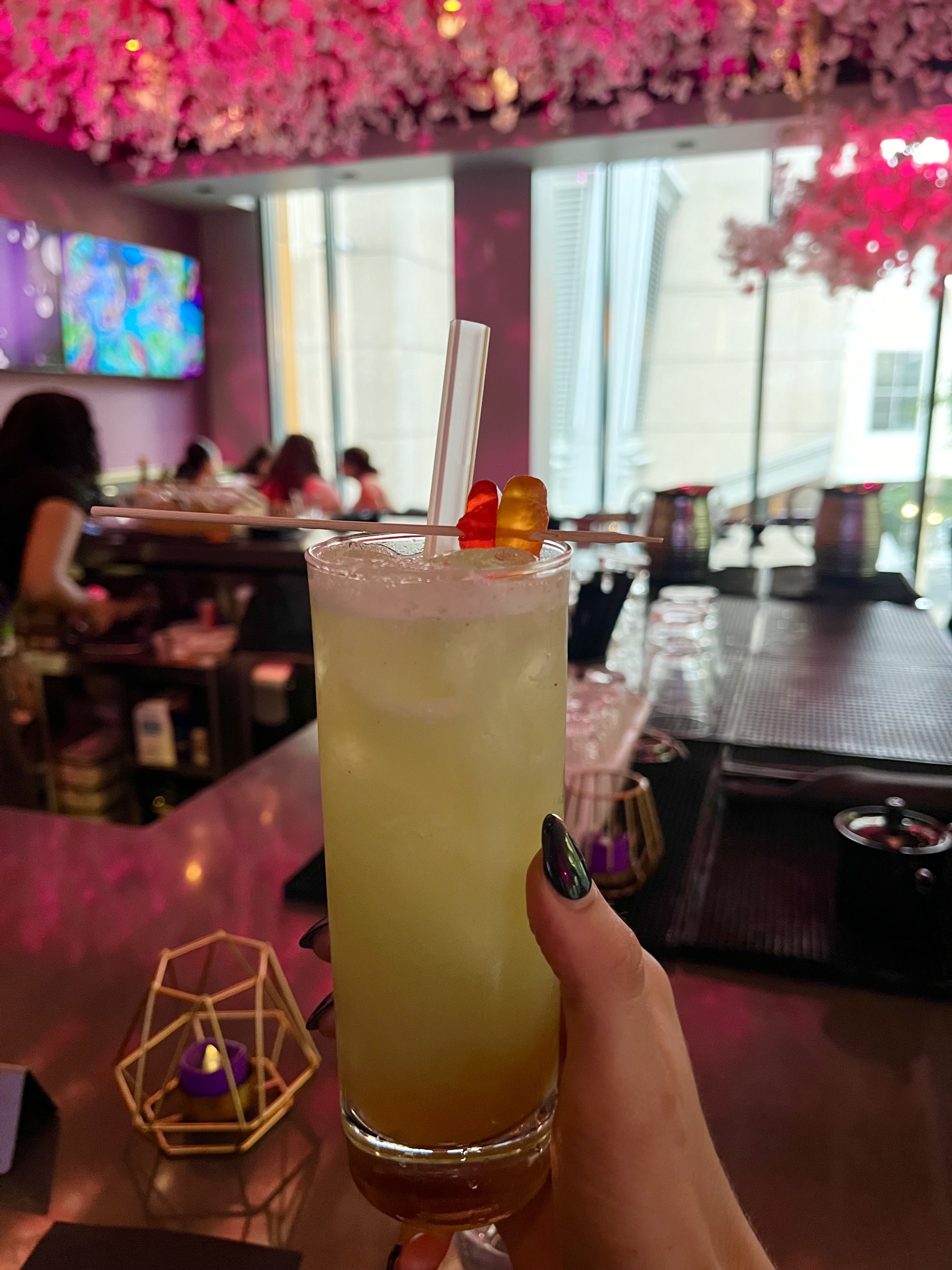 hand holding cocktail