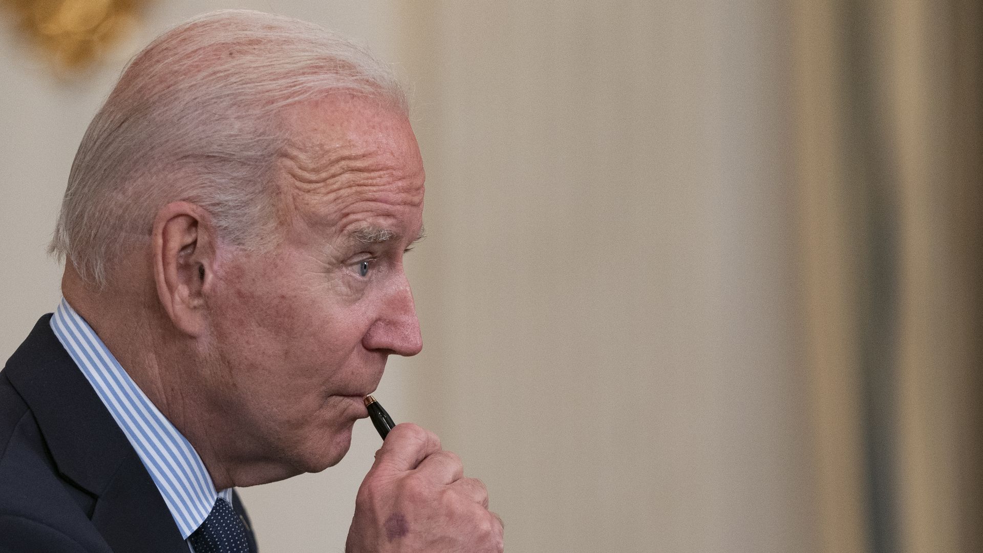 President Biden is seen listening to a question after delivering remarks on Tuesday.