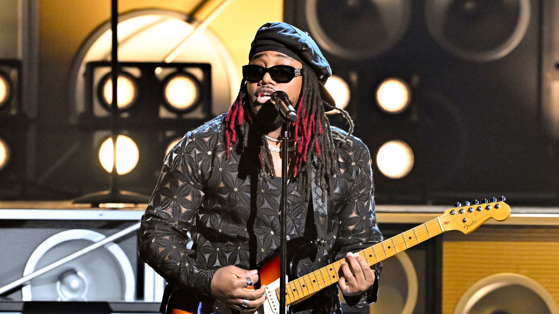 R&B singer Leon Thomas performing at the 2025 BET Awards.