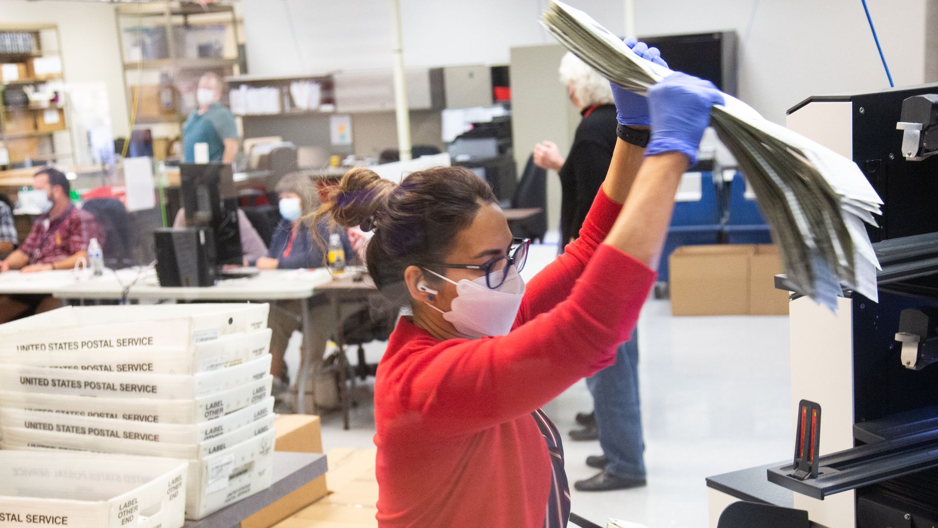 An election worker counting votes in Maricopa County in November 2020.