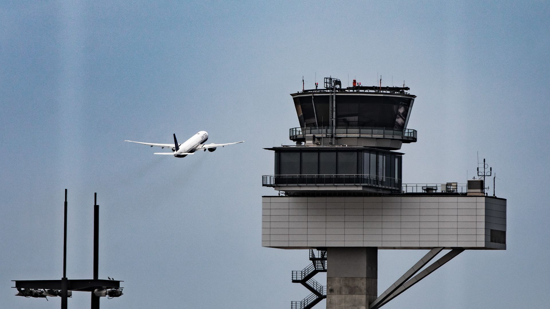 An airplane taking off during a storm