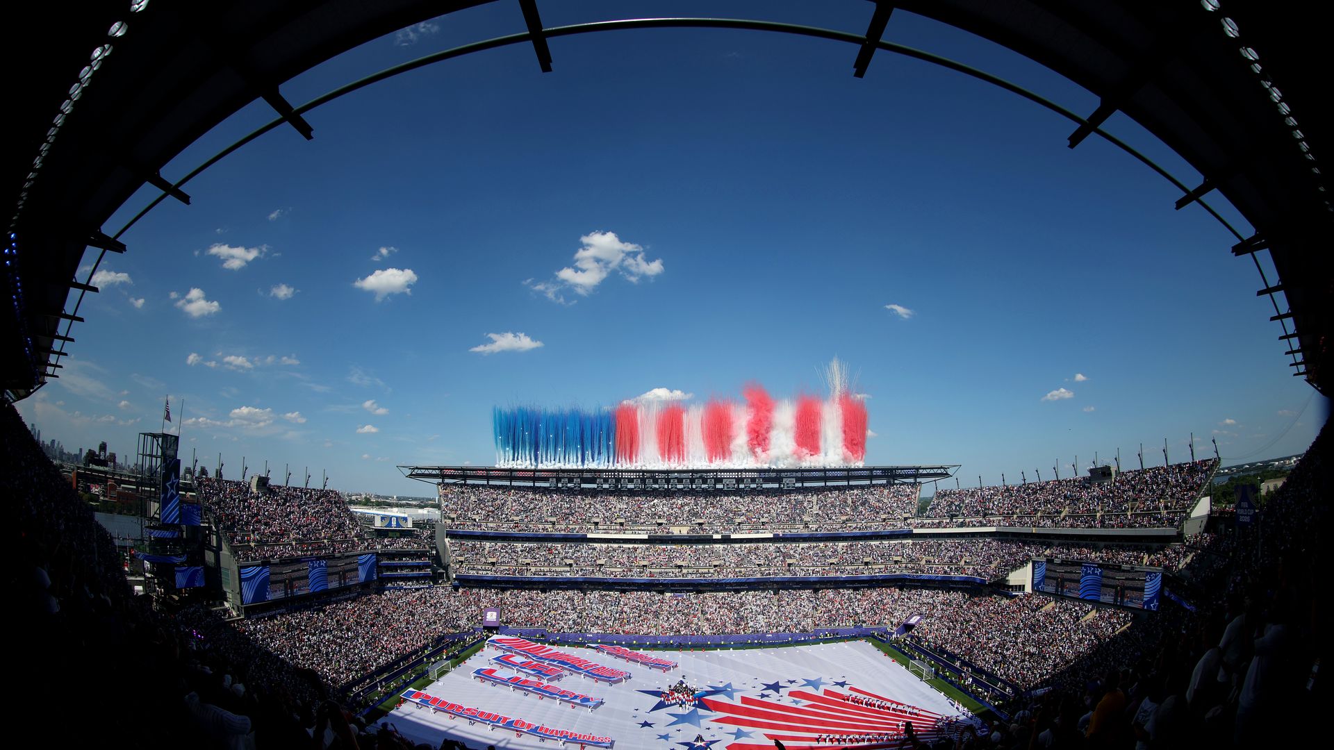 Smokes forming the national flag of the United States before Sunday's Round of 16 match between Paraguay and France.