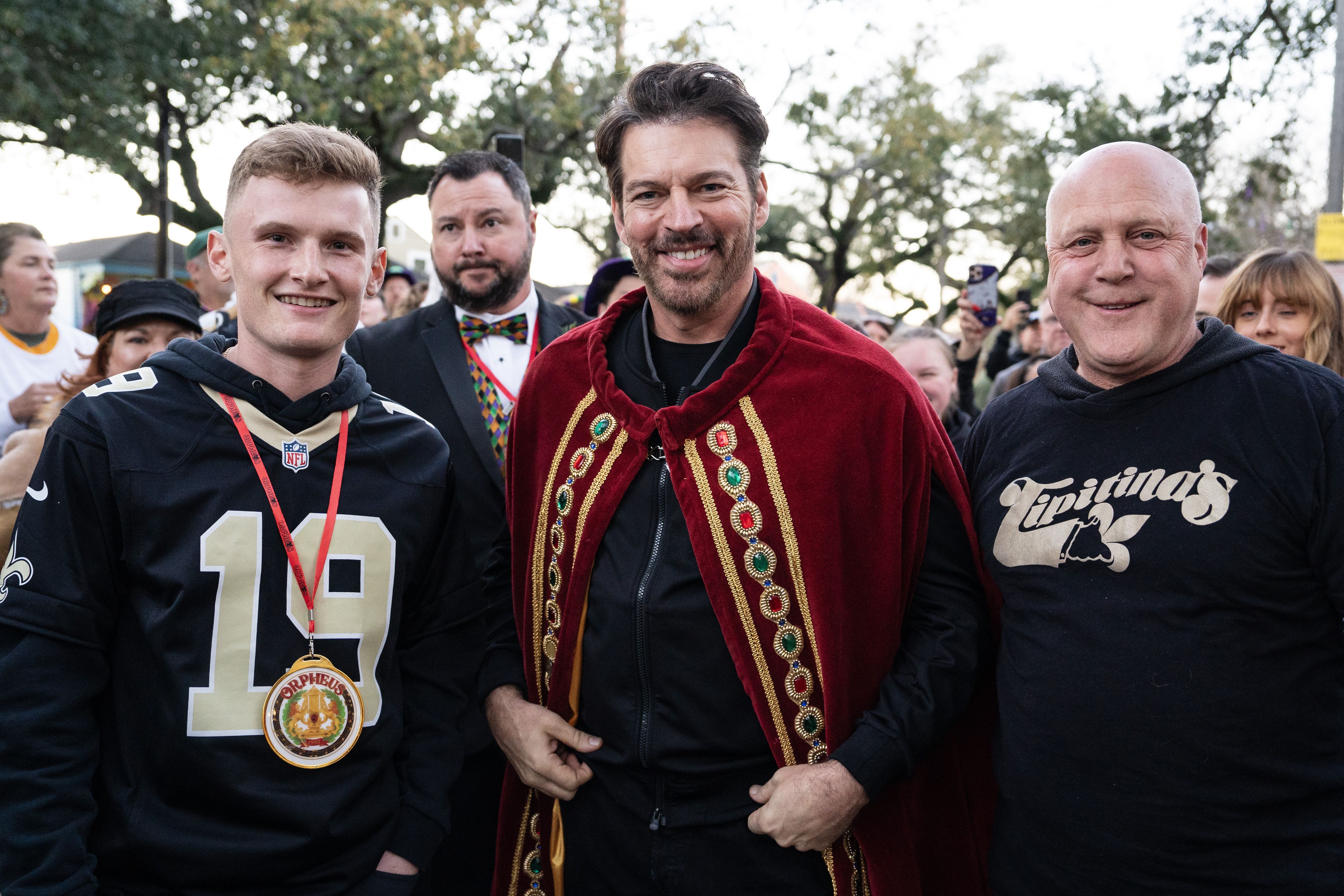 New Orleans Saints kicker Blake Grupe, Harry Connick Jr. and former New Orleans Mayor Mitch Landrieu smile before the Krewe of Orpheus parade.