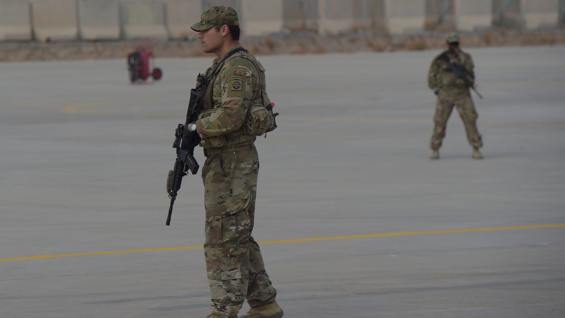 A US soldier stands guard at Kandahar Air base in Afghanistan. 