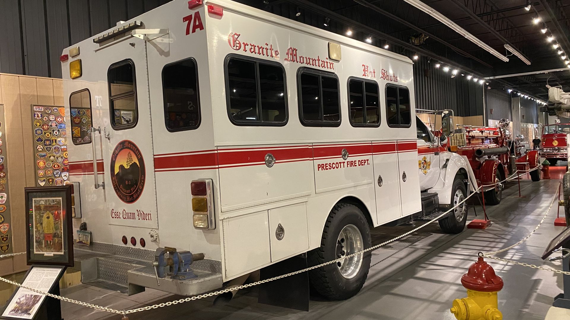 A white truck with the words Granite Mountain Hotshots and Prescott Fire Department on the side.