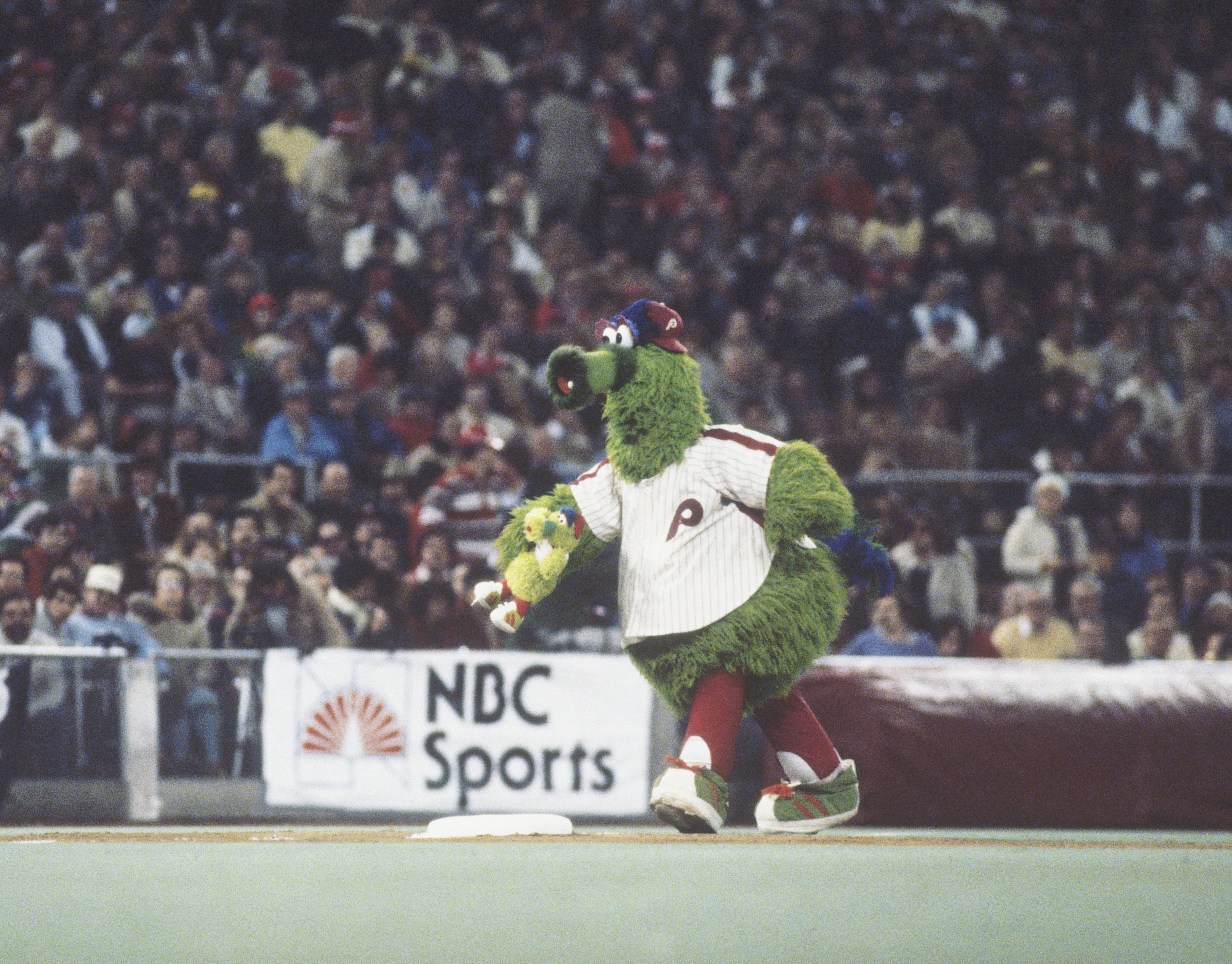 Philadelphia Phillies' mascot Philly Phanatic walks across the field during a game at Veterans Stadium circa 1980 in Philadelphia, Pennsylvania.