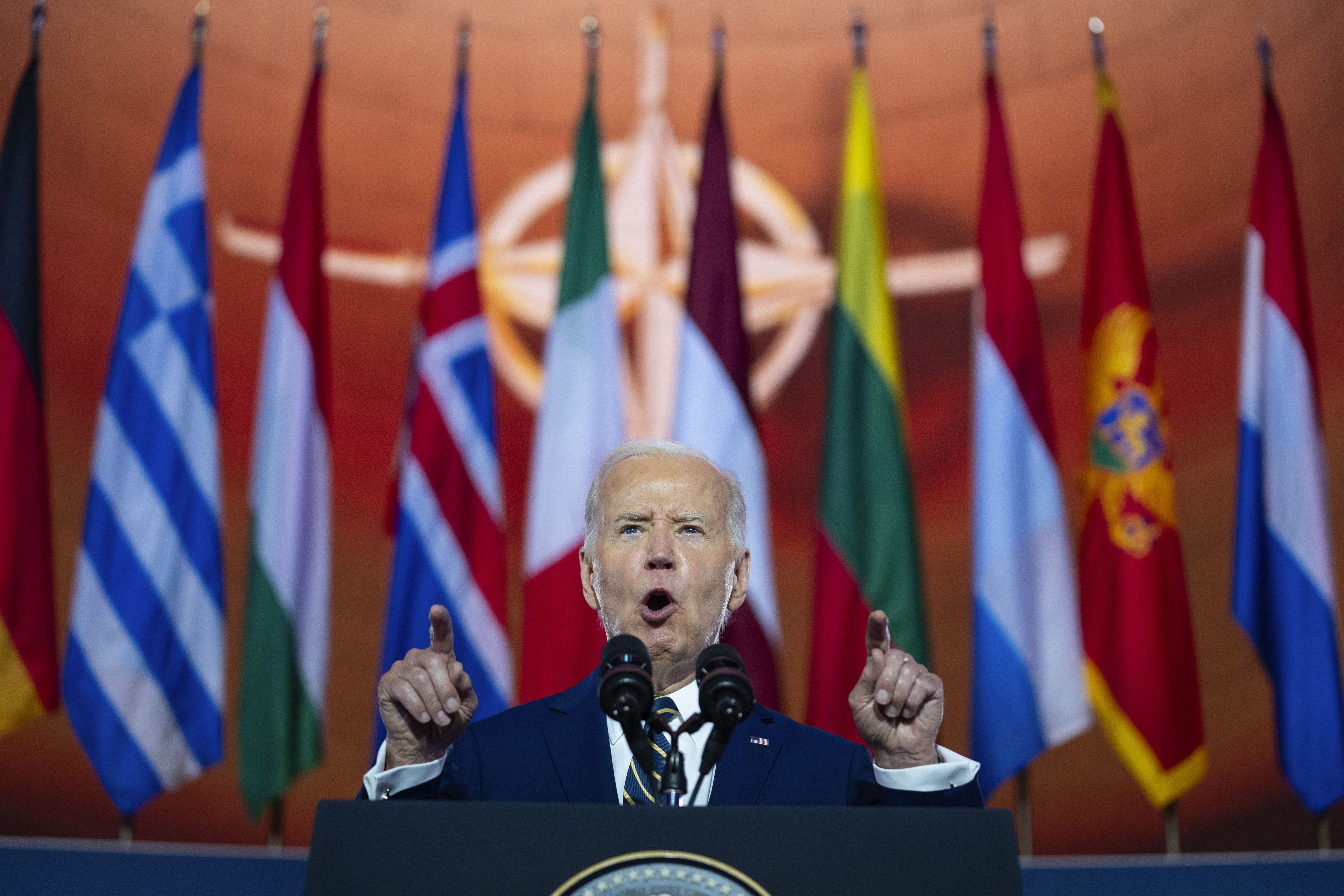 President Joe Biden delivers remarks at the opening ceremony of this week's NATO Summit in D.C. yesterday evening.