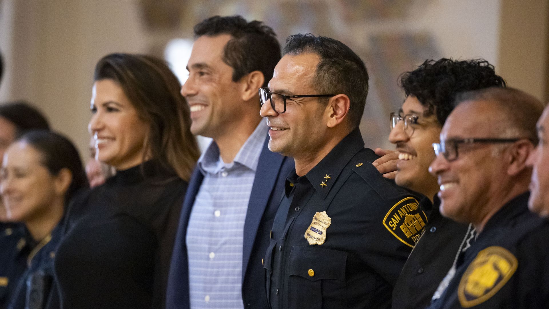 Acting San Antonio police Chief Jesse Salame, center, stands with Councilmembers Marina Alderete Gavito (left), Marc Whyte and Ric Galvan at a farewell event for former Police Chief William McManus in August.