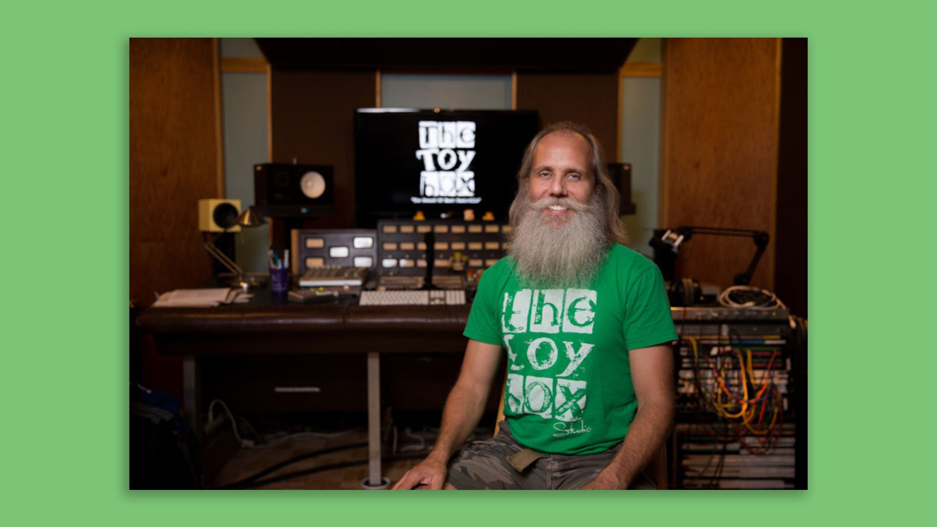 Nashville music producer Lij Shaw sits in front of a control panel in his recording studio.