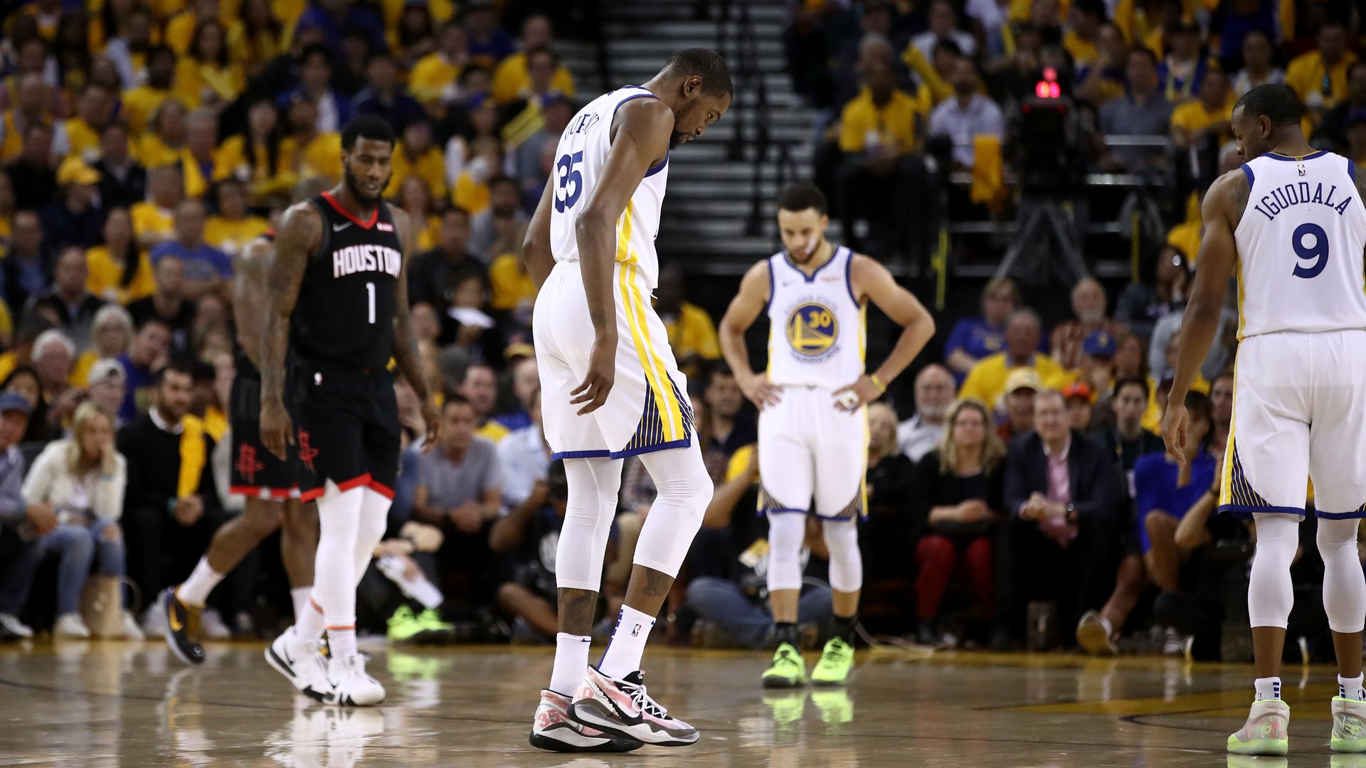Kevin Durant limps off the court