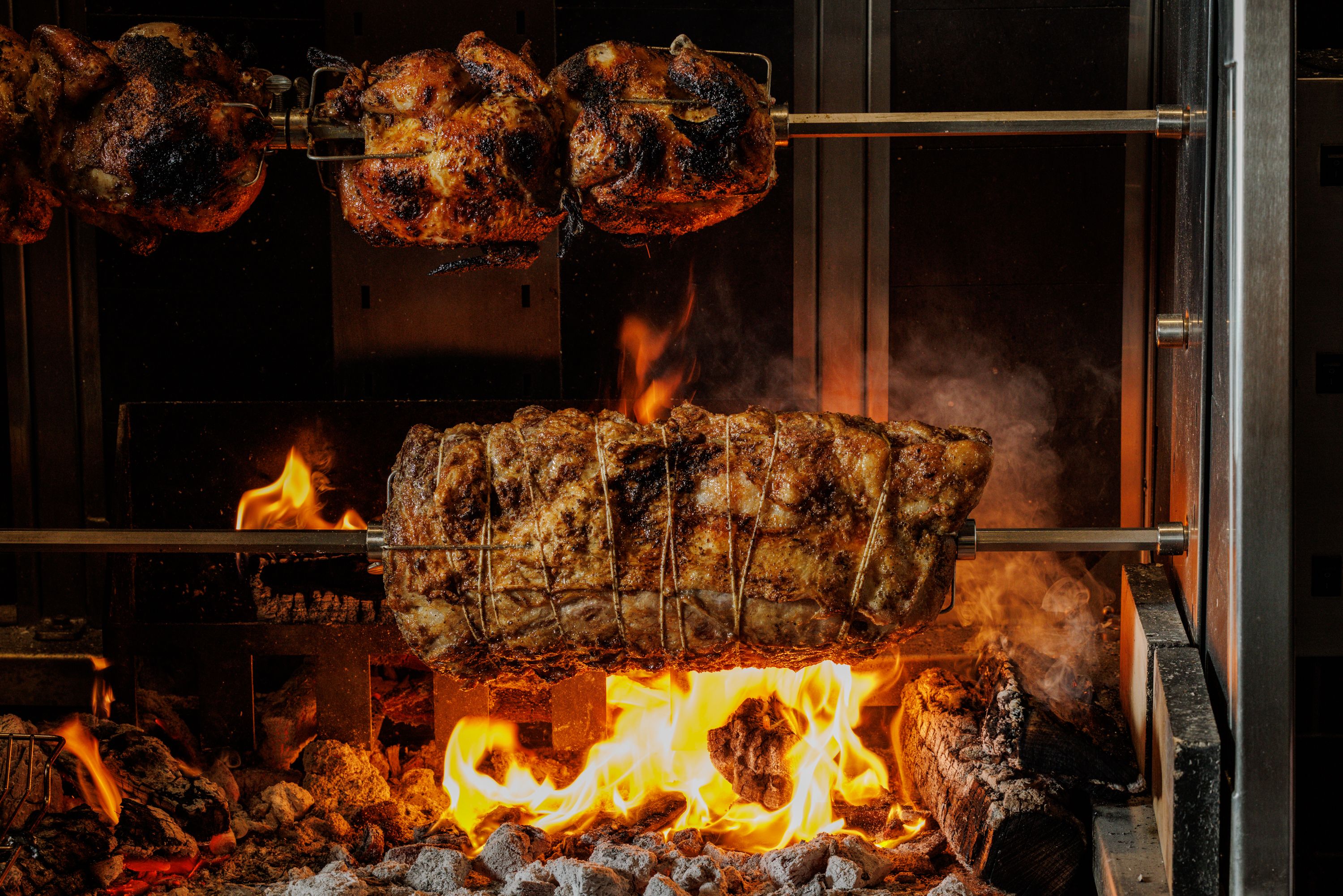 roasting meats over fire