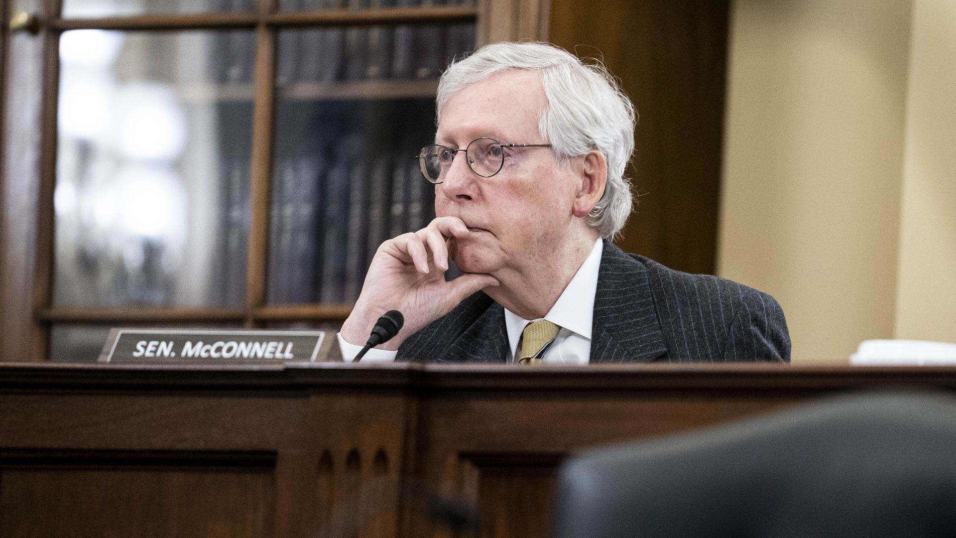 Photo of Mitch McConnell sitting down 