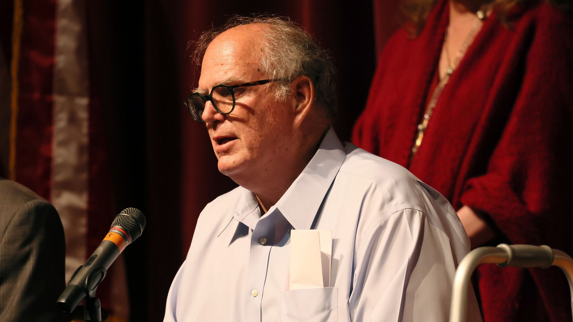 Photo of Don McLaughlin speaking into a microphone