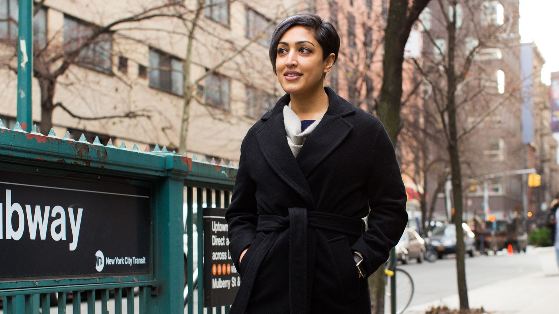 Rumman Chowdhury passes a subway station in NYC