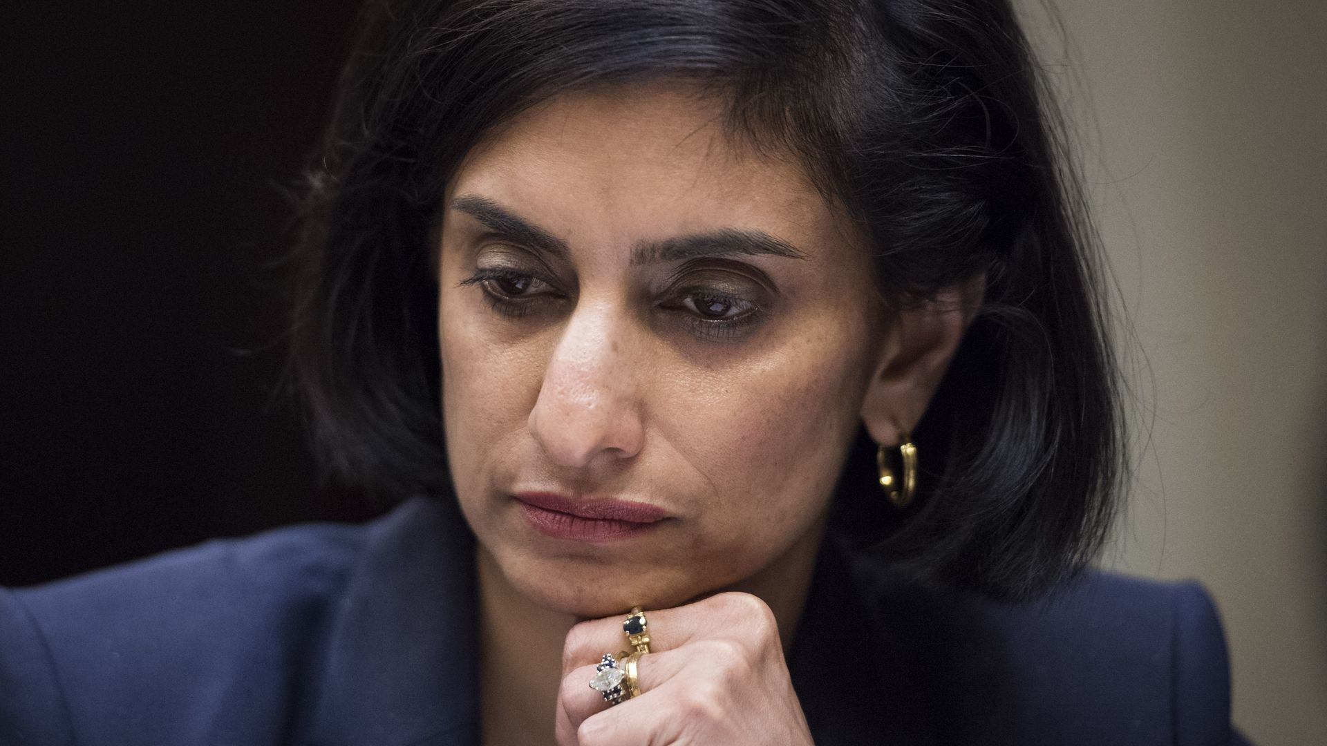This is a photo of CMS administrator Seema Verma looking down.