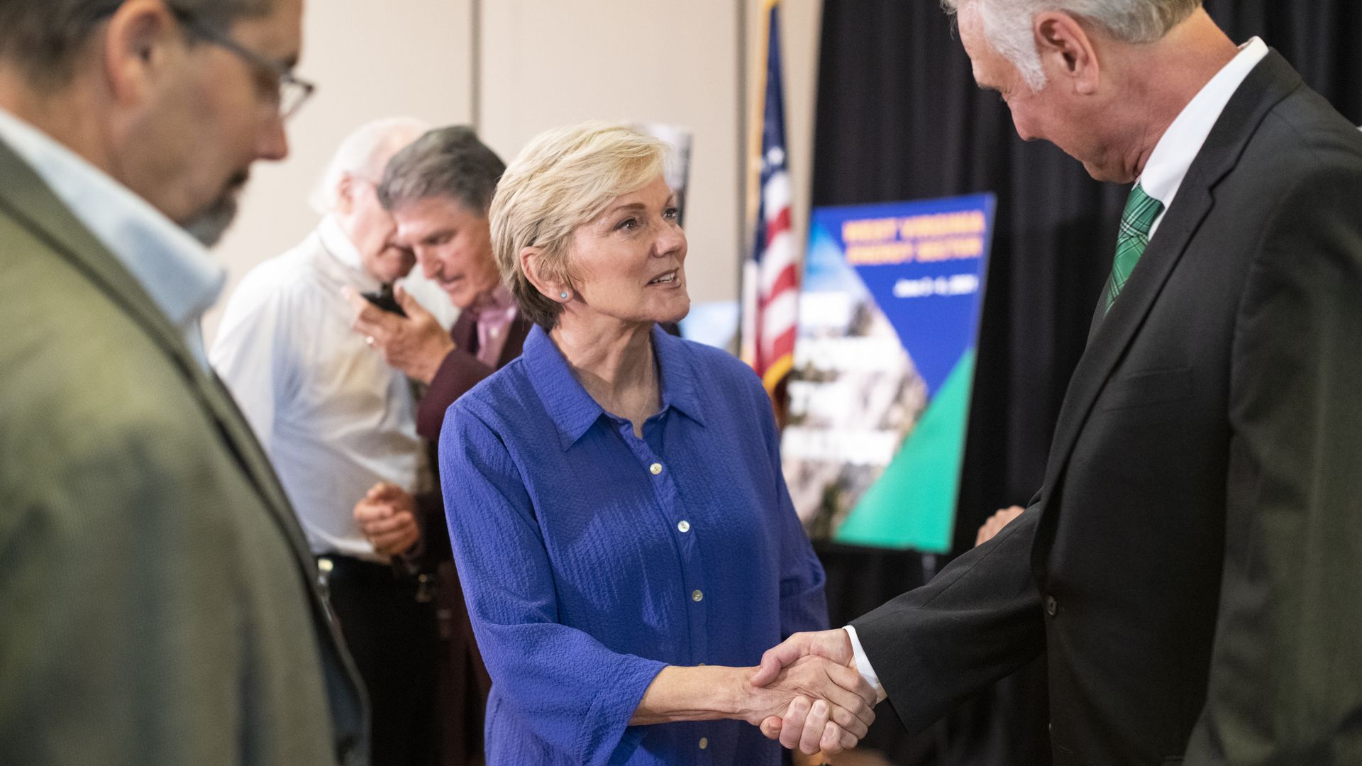 Energy Secretary Jennifer M. Granholm shakes hands at an event in West Virginia in June.