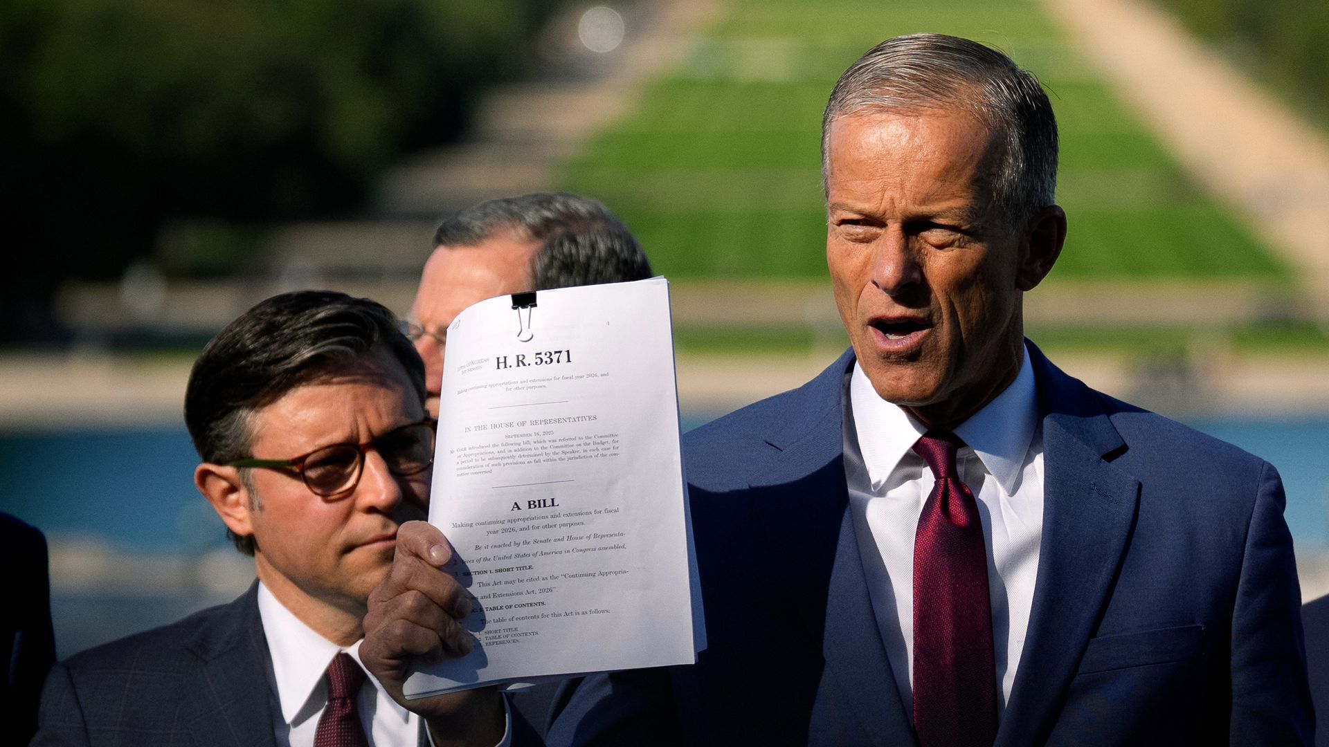 John Thune and Mike Johnson at a press conference