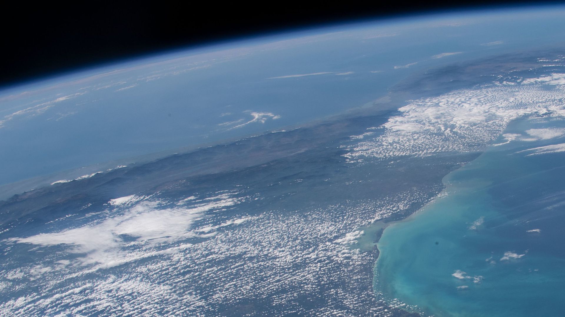 A view of Earth from space above the ocean