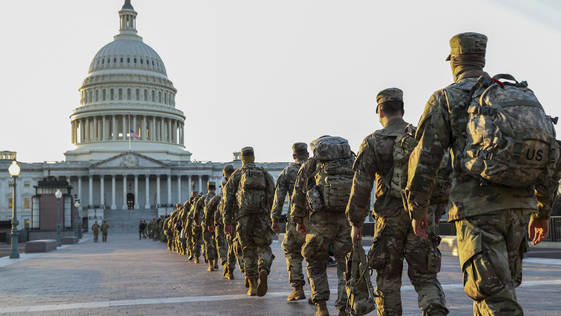National Guard troops march toward Capitol