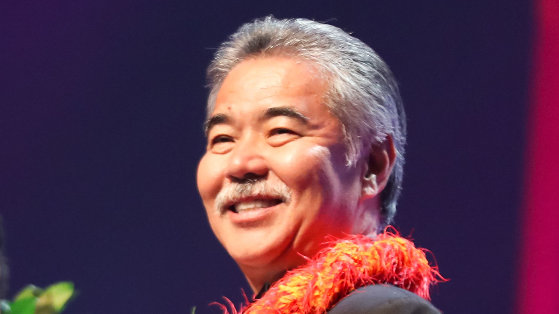  Governor of Hawaii David Ige presents the 'Group of the Year' award during the 39th Na Hoku Hanohano Awards at Hawaii Convention Center on May 28, 2016 in Honolulu, Hawaii.
