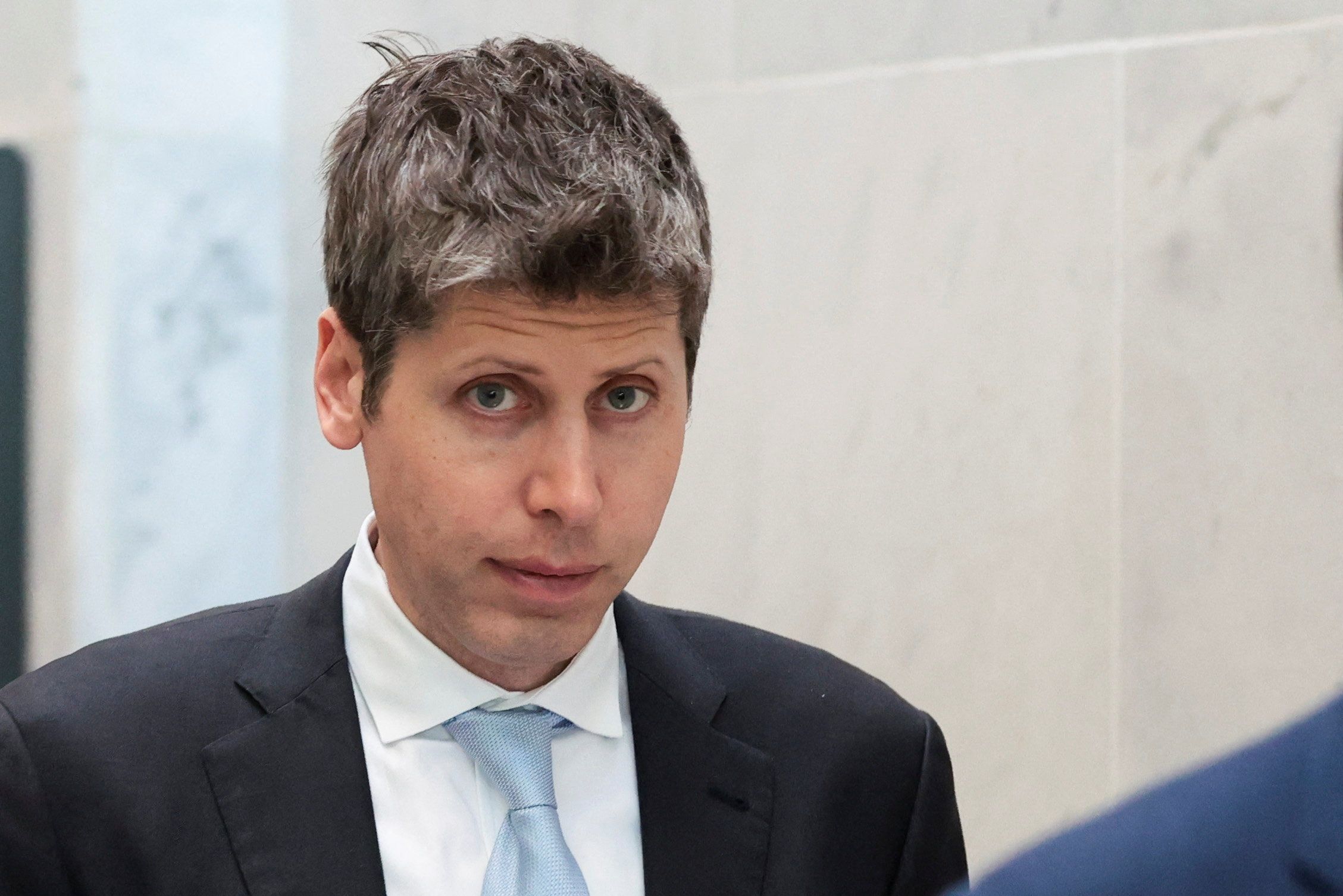Sam Altman walks through the Hart Senate Office Building on June 3.