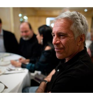 Latest Epstein photos include "Lolita" quotes written on a woman's body