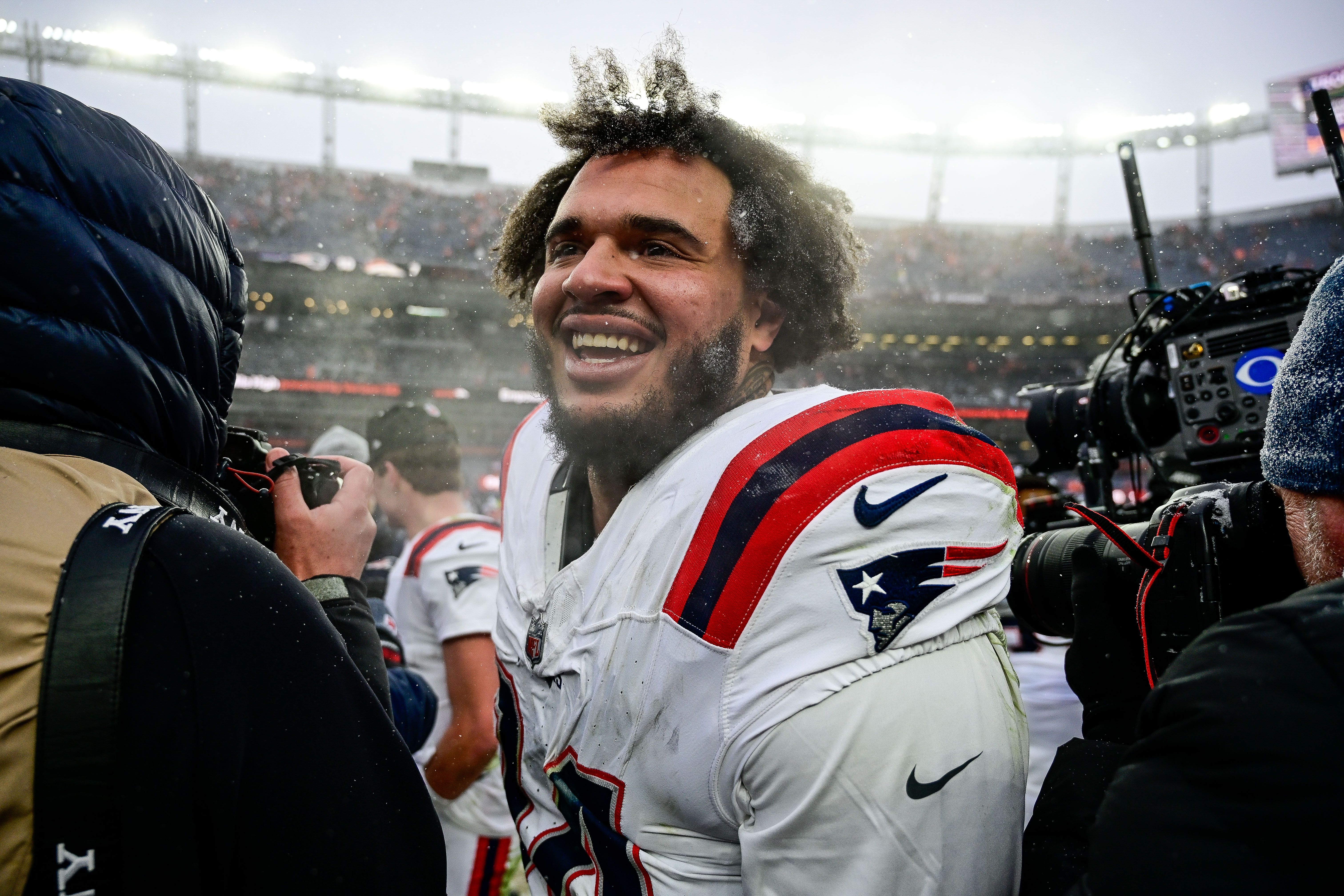 New England Patriots defensive tackle Cory Durden (94) celebrates after a win against the Denver Broncos in the AFC Championship Game at Empower Field at Mile High on January 25, 2026 in Denver, Colorado. (Photo by Dustin Bradford/Icon Sportswire via Getty Images)