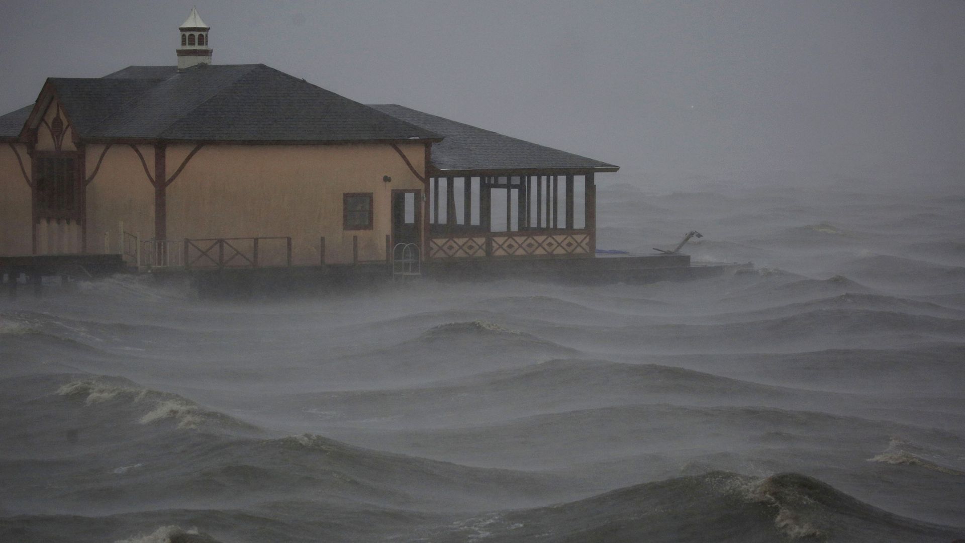 A boathouse in the middle of a storm surge caused by Hurricane Delta making landfall in Lake Charles, Louisiana, on Oct. 9, 2020.