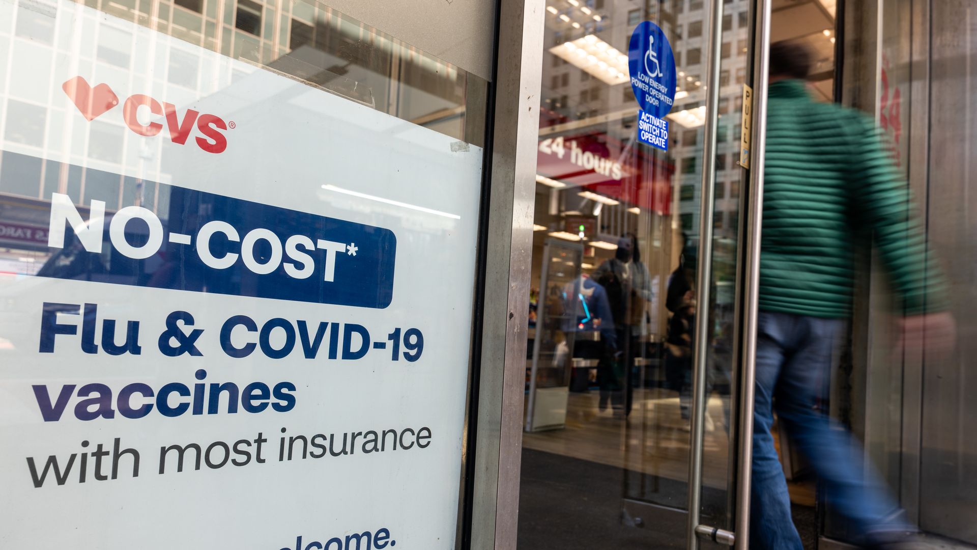 CVS pharmacy with Covid and flu shots advertised.