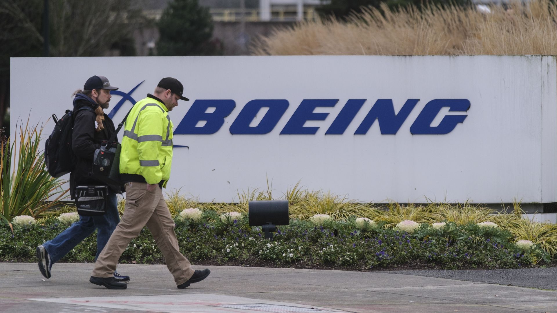 Workers walk in to the Boeing 737 factory on December 16, 2019 in Renton, Washington.