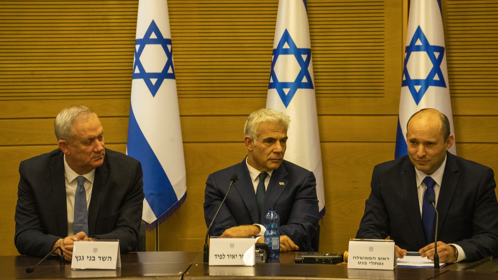 Israel Defense Minister Benny Gantz, Foreign Minister Yair Lapid and Prime Minister Naftali Bennett.