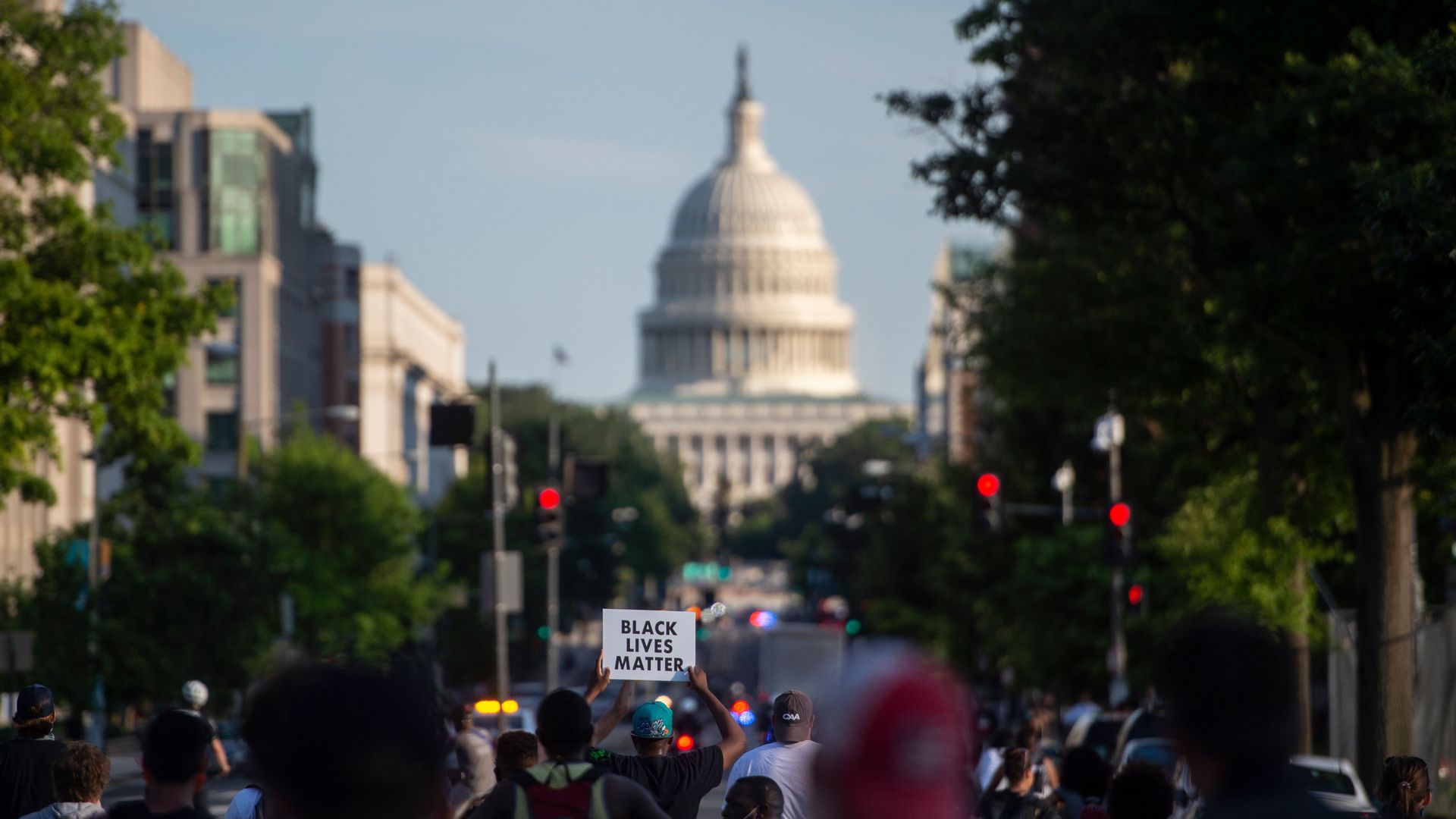  Black Lives Matter protesters march through the streets near the US Capitol in Washington, DC on June 24