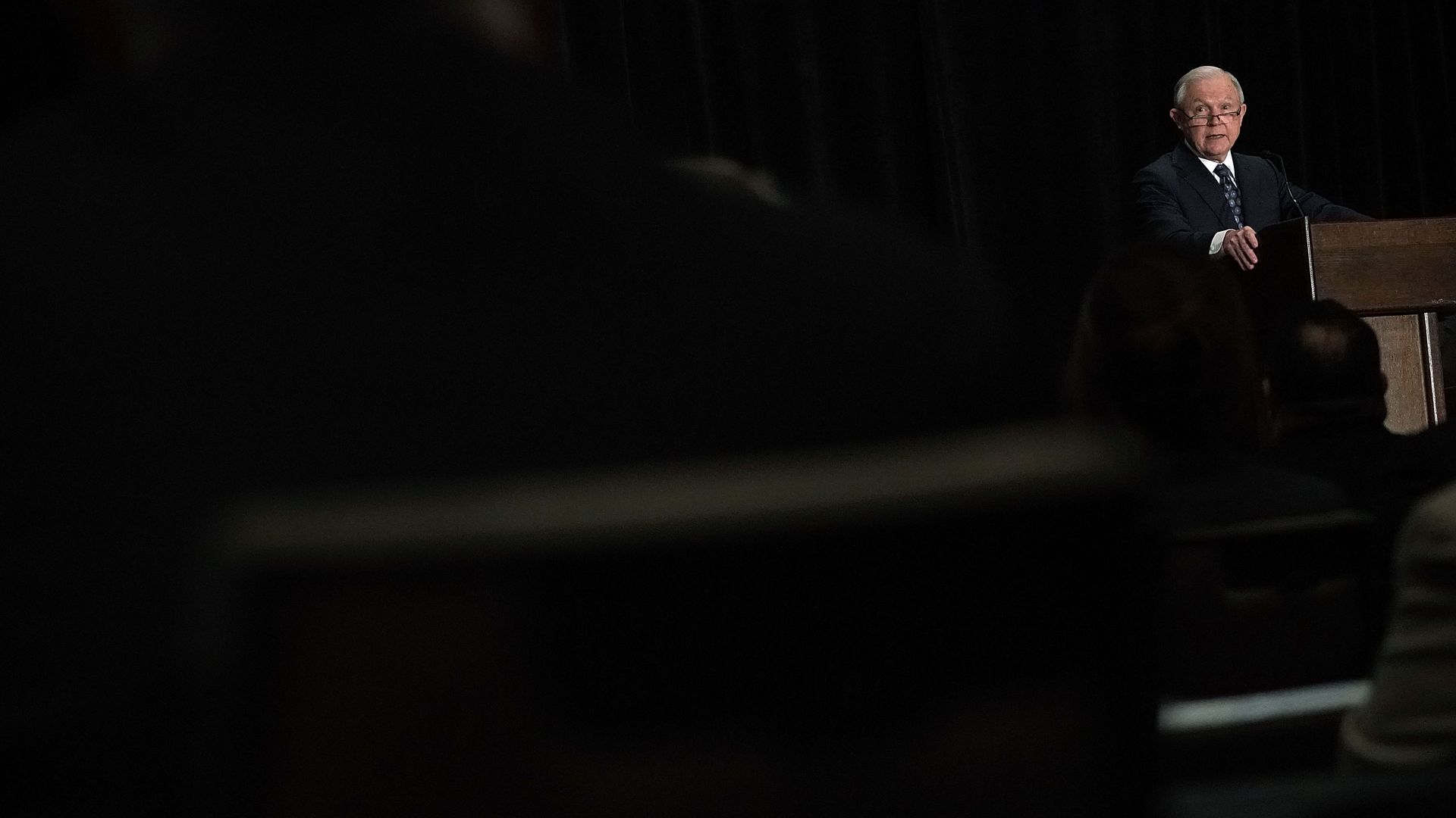 Jeff Sessions in a dark room 