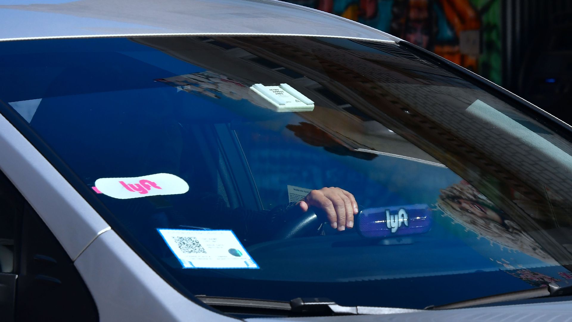 Lyft driver driving