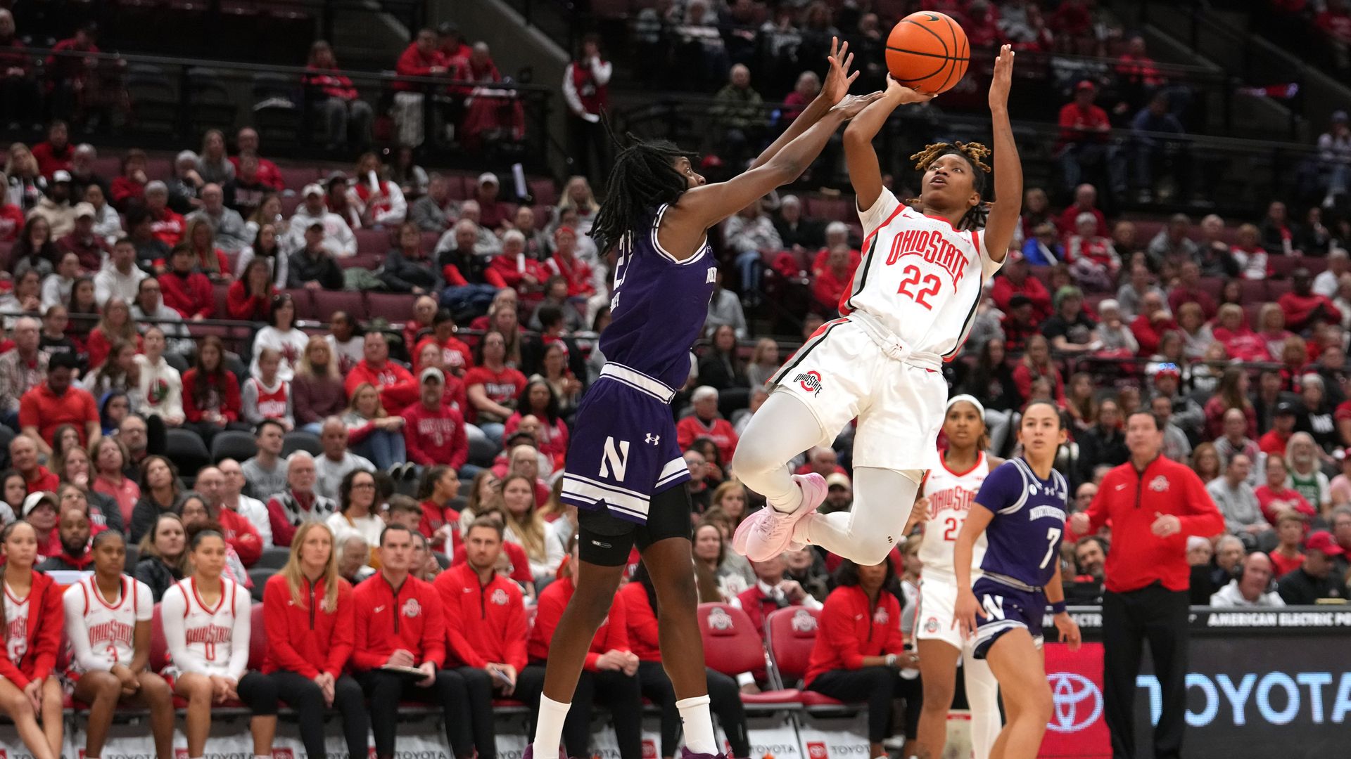 Ohio State guard Jaloni Cambridge shoots over a defender