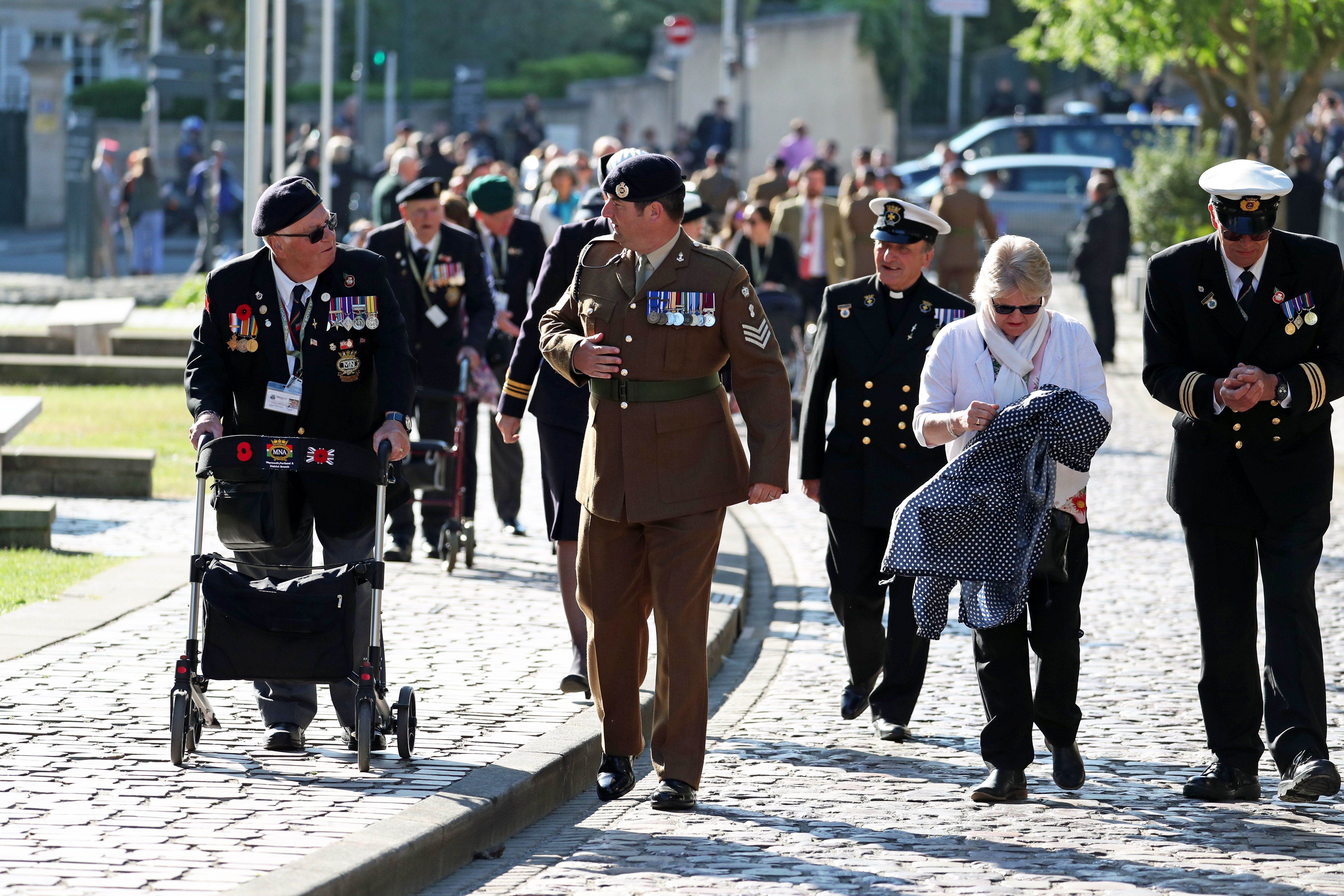 Guests arrive at the Bayeux Cathedral, France, for the Royal British Legion Service of Remembrance, as part of commemorations for the 75th anniversary of the D-Day landings. 