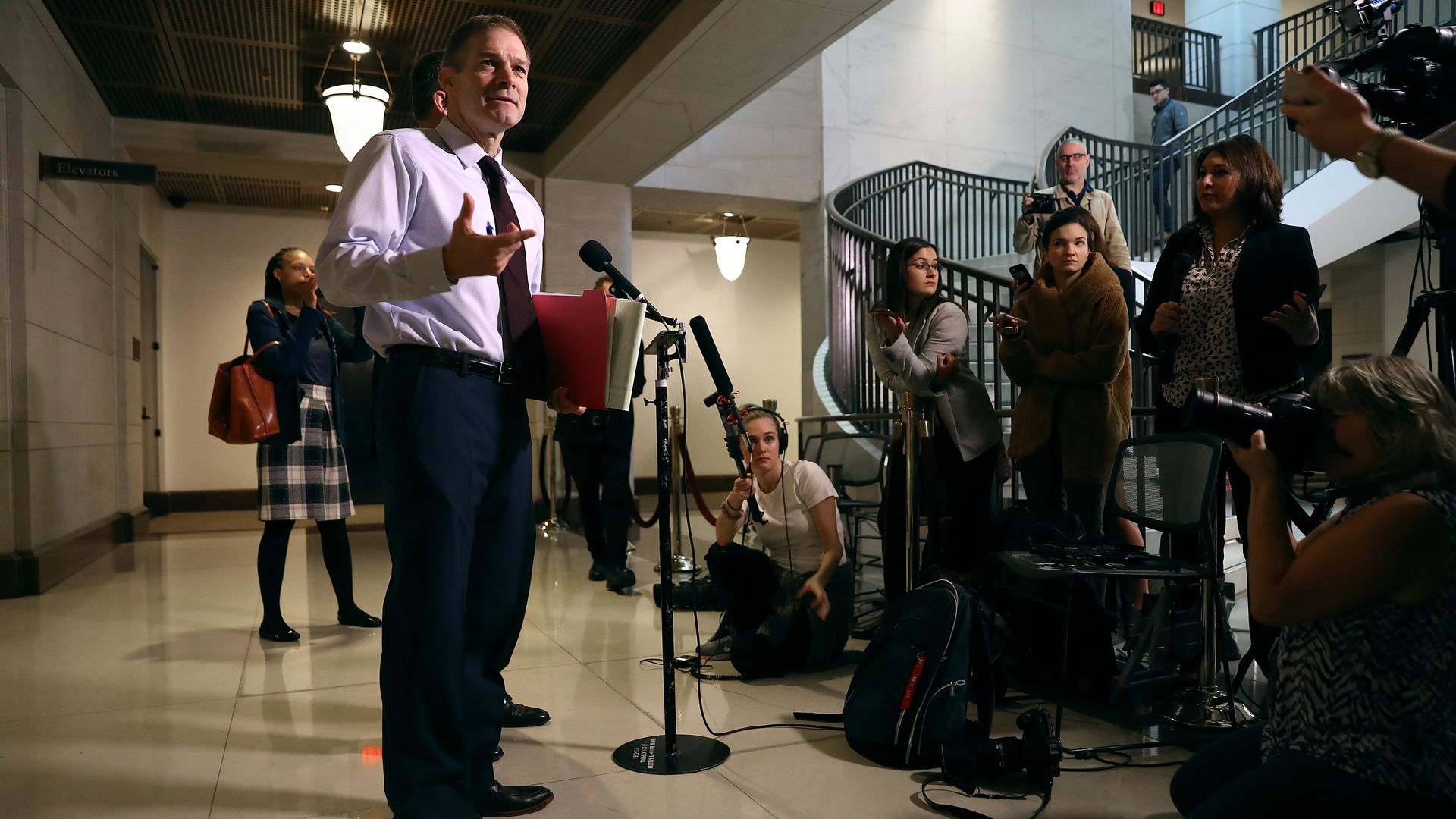 Rep. Jim Jordan talks to reporters before heading into a closed door hearing of the House Intelligence, Judiciary and Foreign Affairs committees