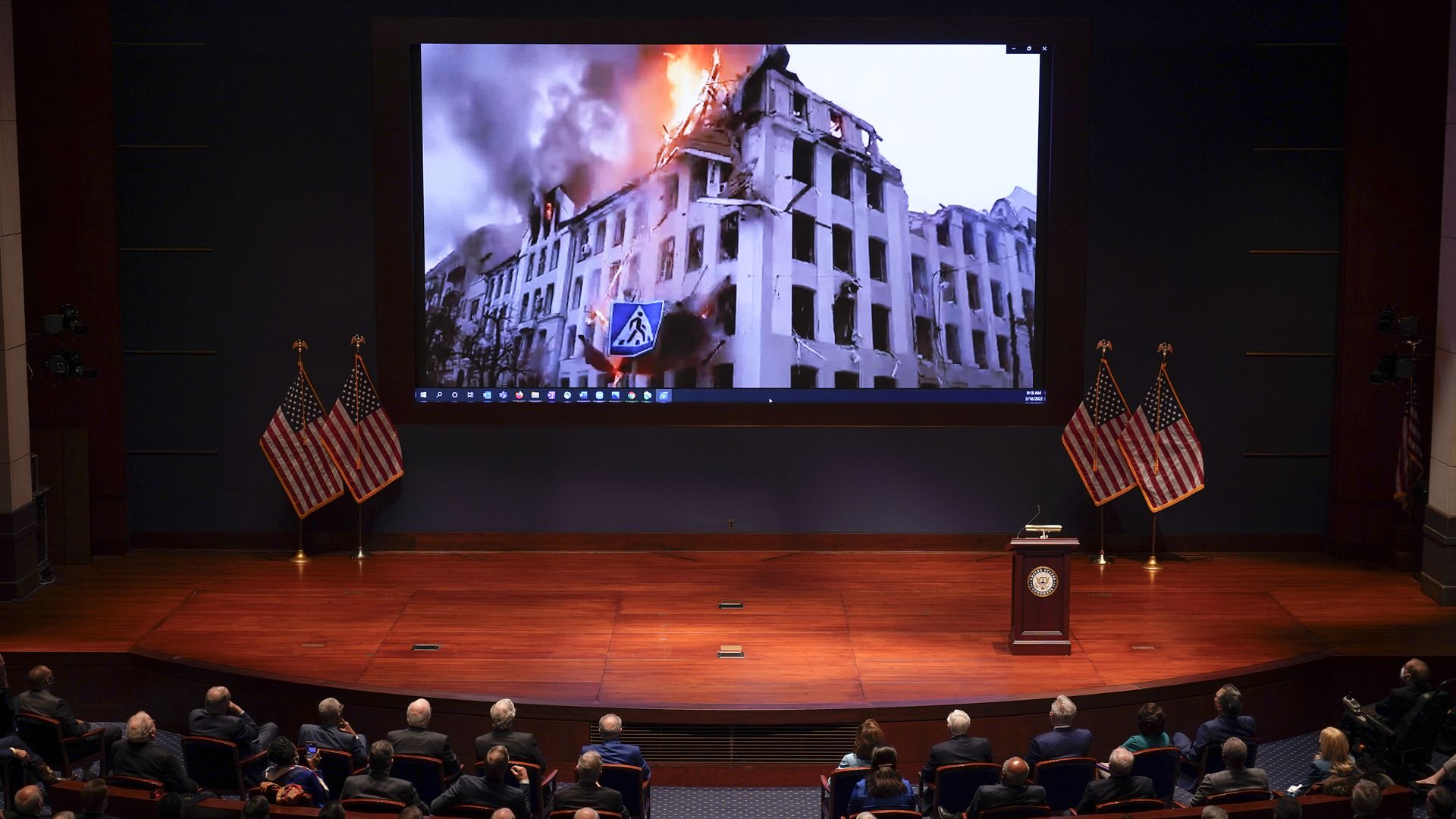 A video is shown playing during the speech by Ukraine's president to the U.S. Congress.