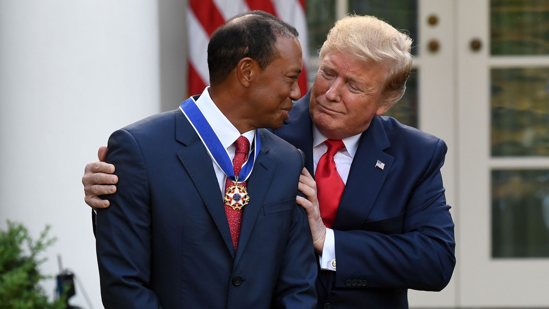 President Donald Trump presents US golfer Tiger Woods with the Presidential Medal of Freedom during a ceremony in the Rose Garden of the White House in Washington, DC, Monday.