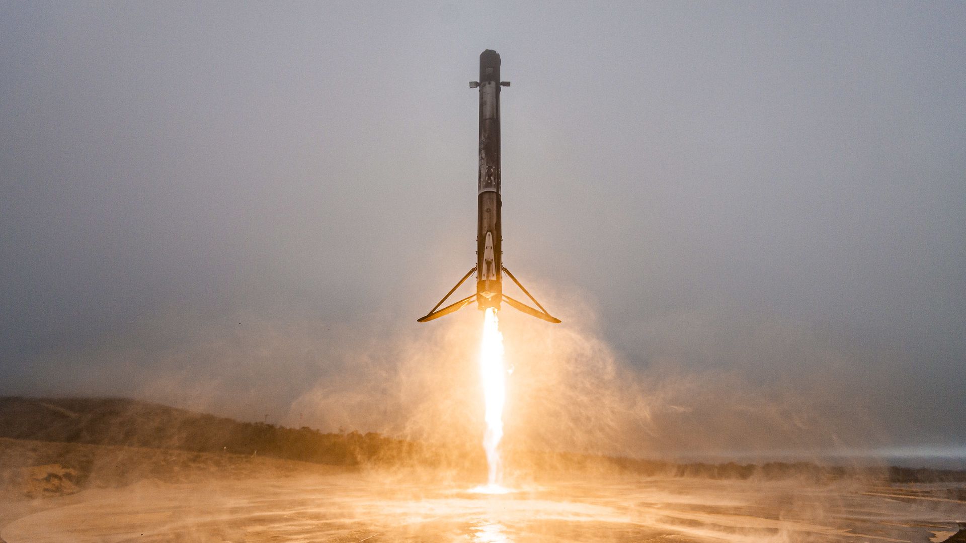 A SpaceX Falcon 9 booster coming in for a landing