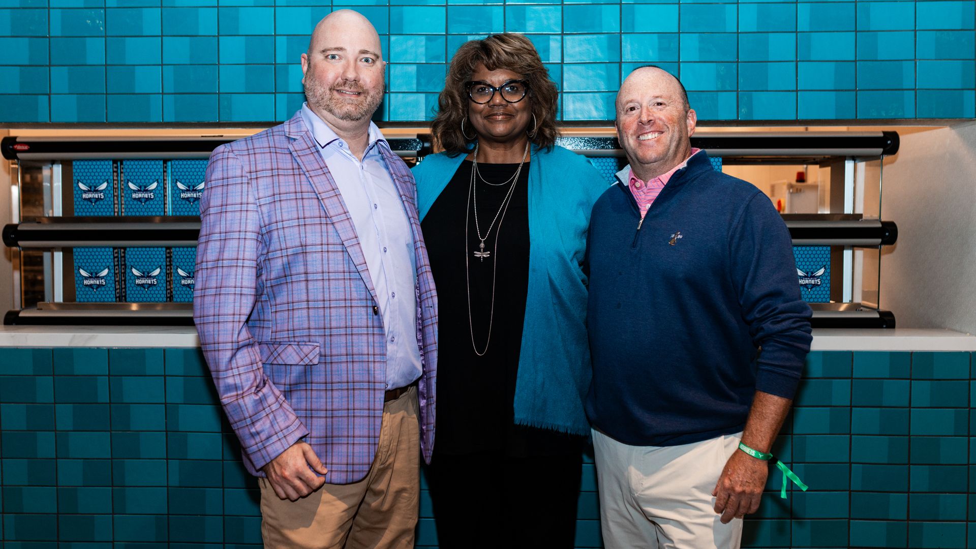 From left: Levy regional director Carter Witt, HSE executive vice president and chief venues officer Donna Julian and Rare Roots Hospitality owner Jon Dressler. Photo: Courtesy of the Charlotte Hornets