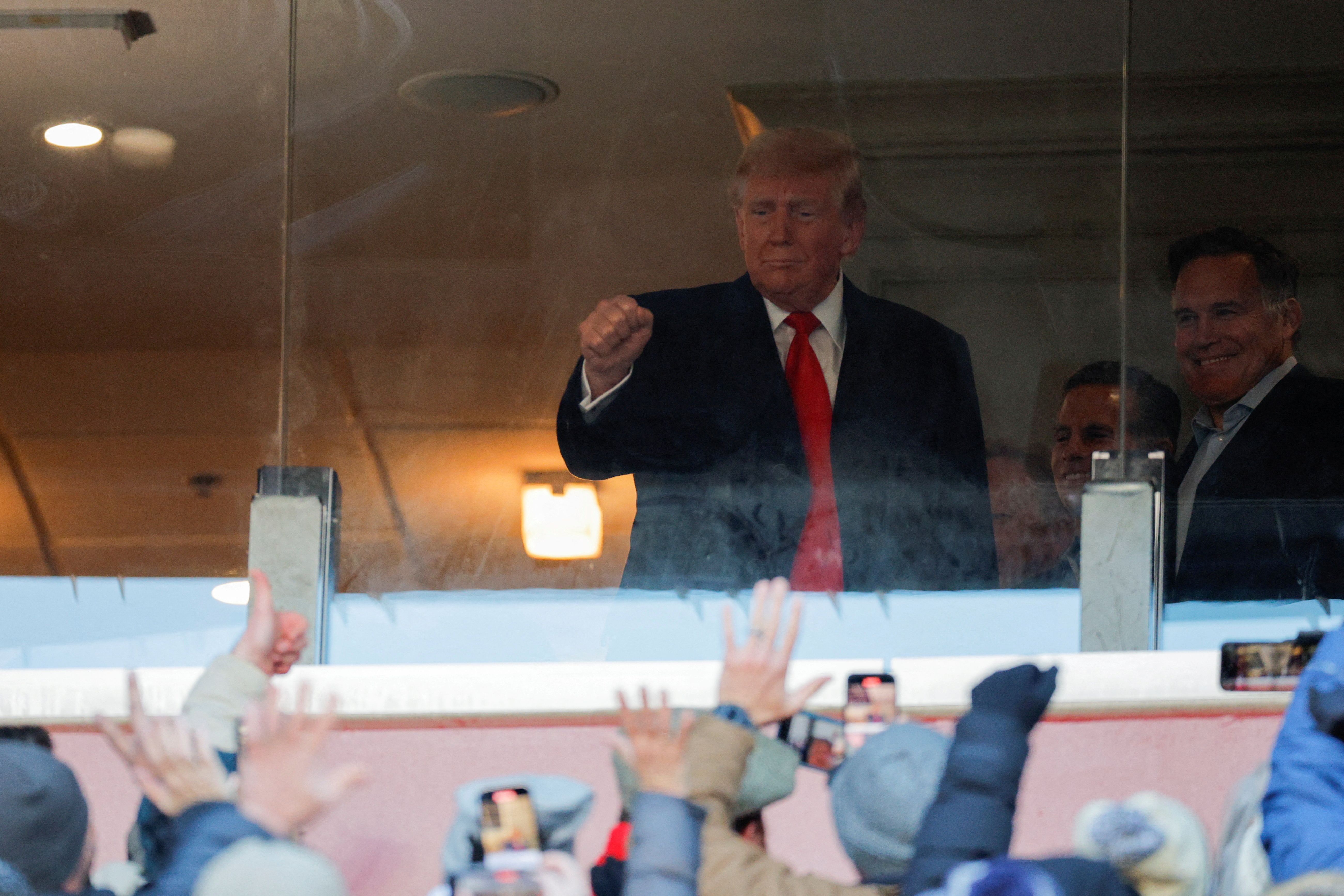 President-elect Donald Trump waves to people at the Army-Navy game in Philadelphia on Saturday.