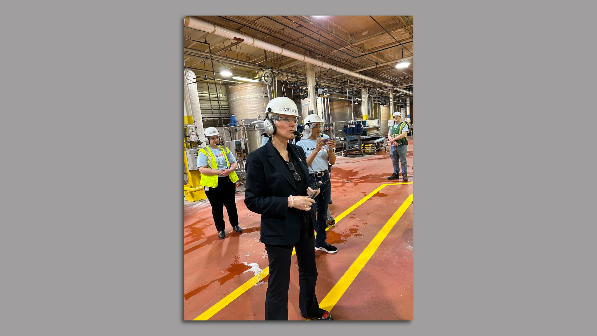 Granholm on a factory floor