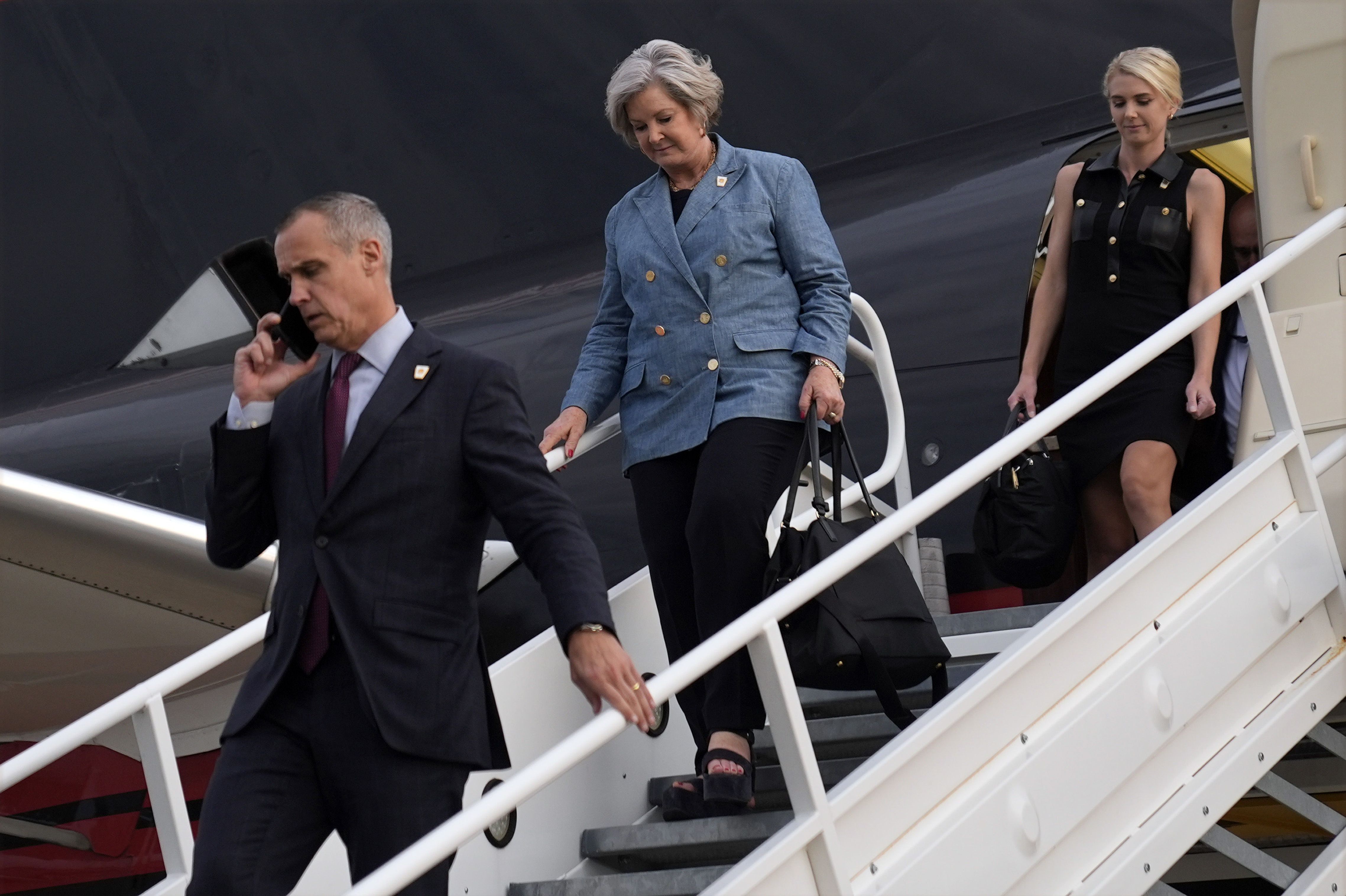 Corey Lewandowski, Susie Wiles and Natalie Harp arrive with then-candidate Donald Trump in Fayetteville, N.C., in 2024. Photo: Evan Vucci/AP