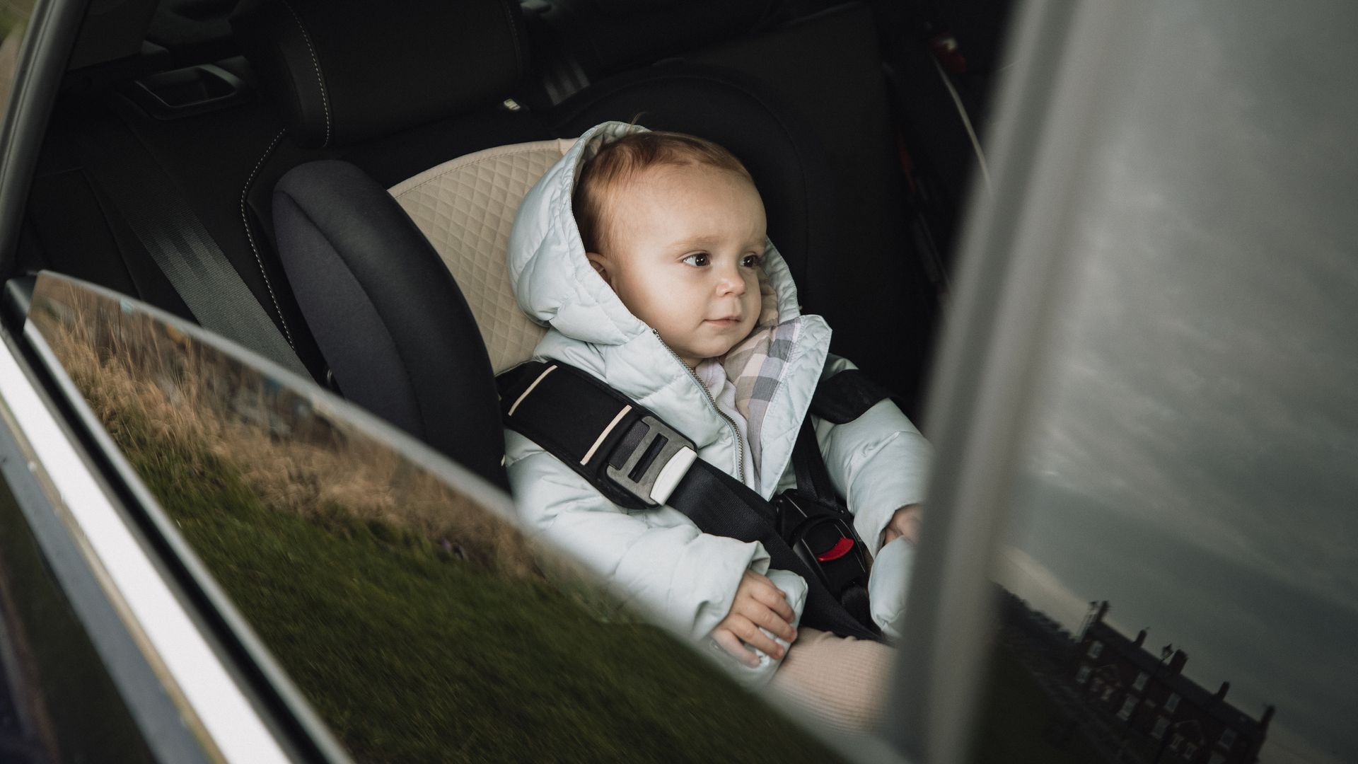 A baby in a carseat.