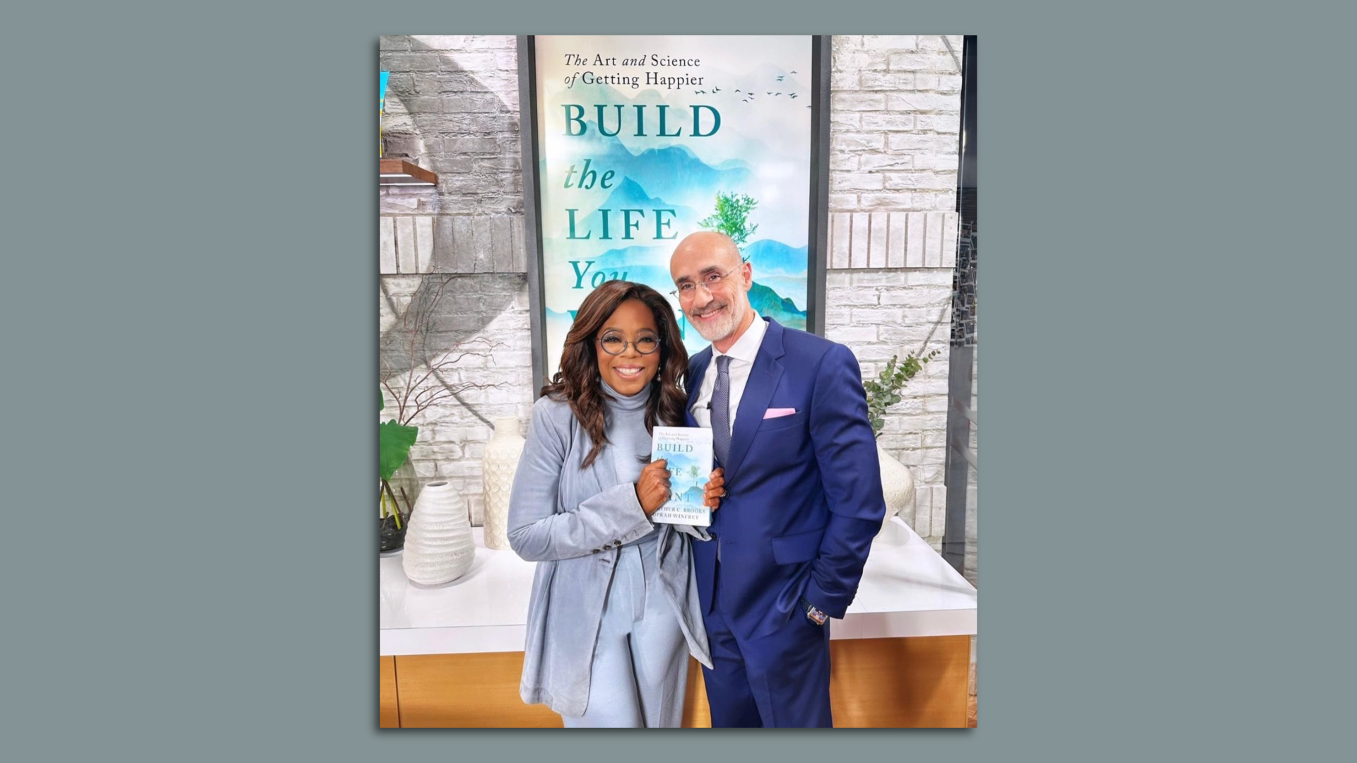 Oprah Winfrey with author Arthur Brooks with their  bestseller, "Build the Life You Want: The Art and Science of Getting Happier." 