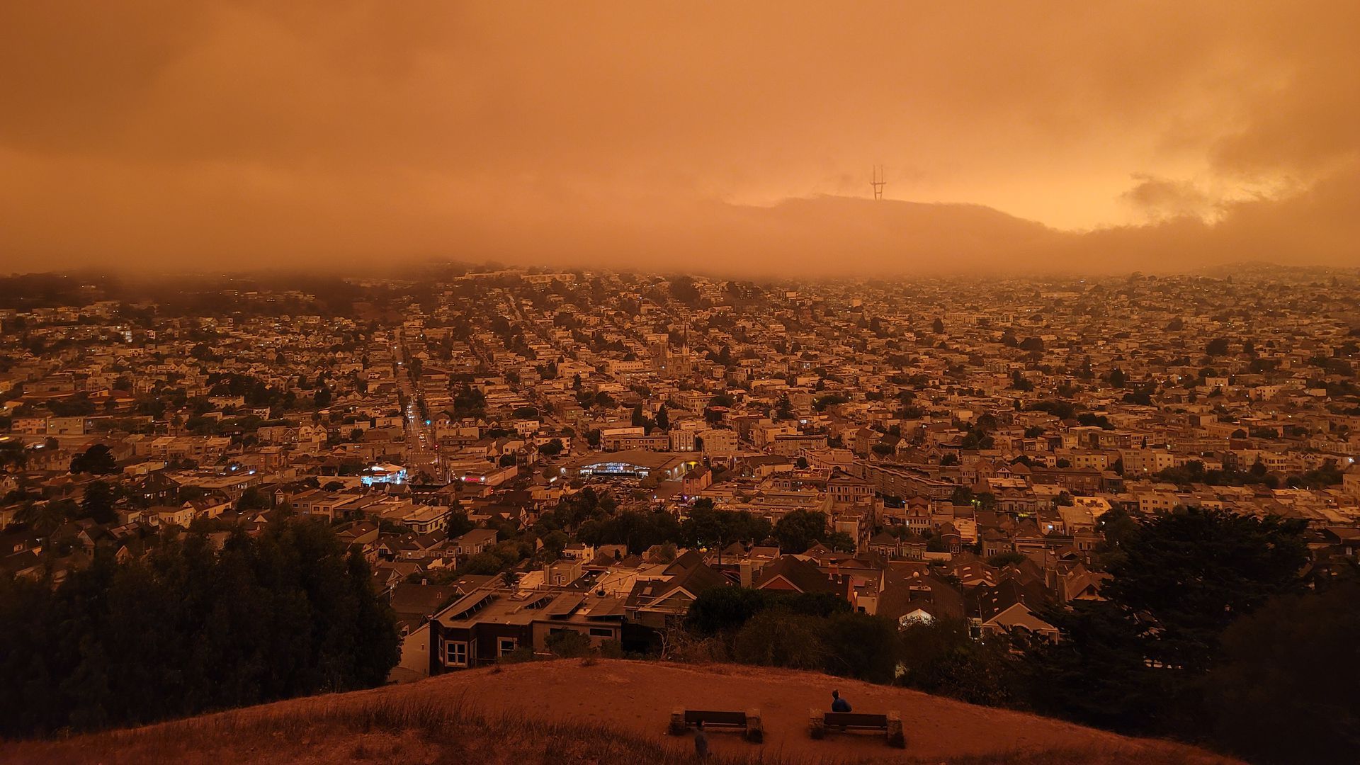 An orange sky as a result of wildfires is seen in San Francisco